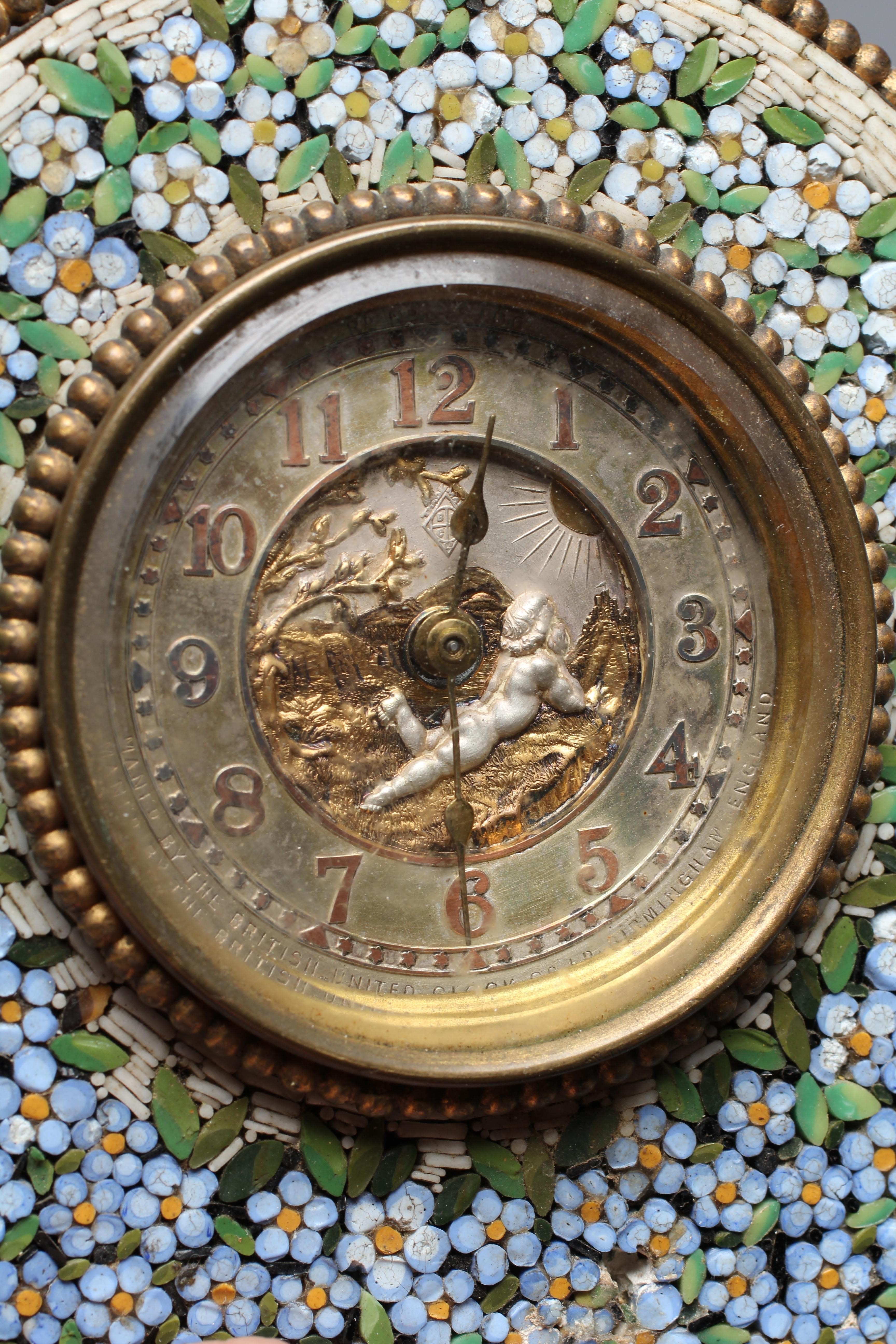 A VICTORIAN GILT METAL MICRO MOSAIC STRUT BACK DRESSING TABLE TIMEPIECE Image