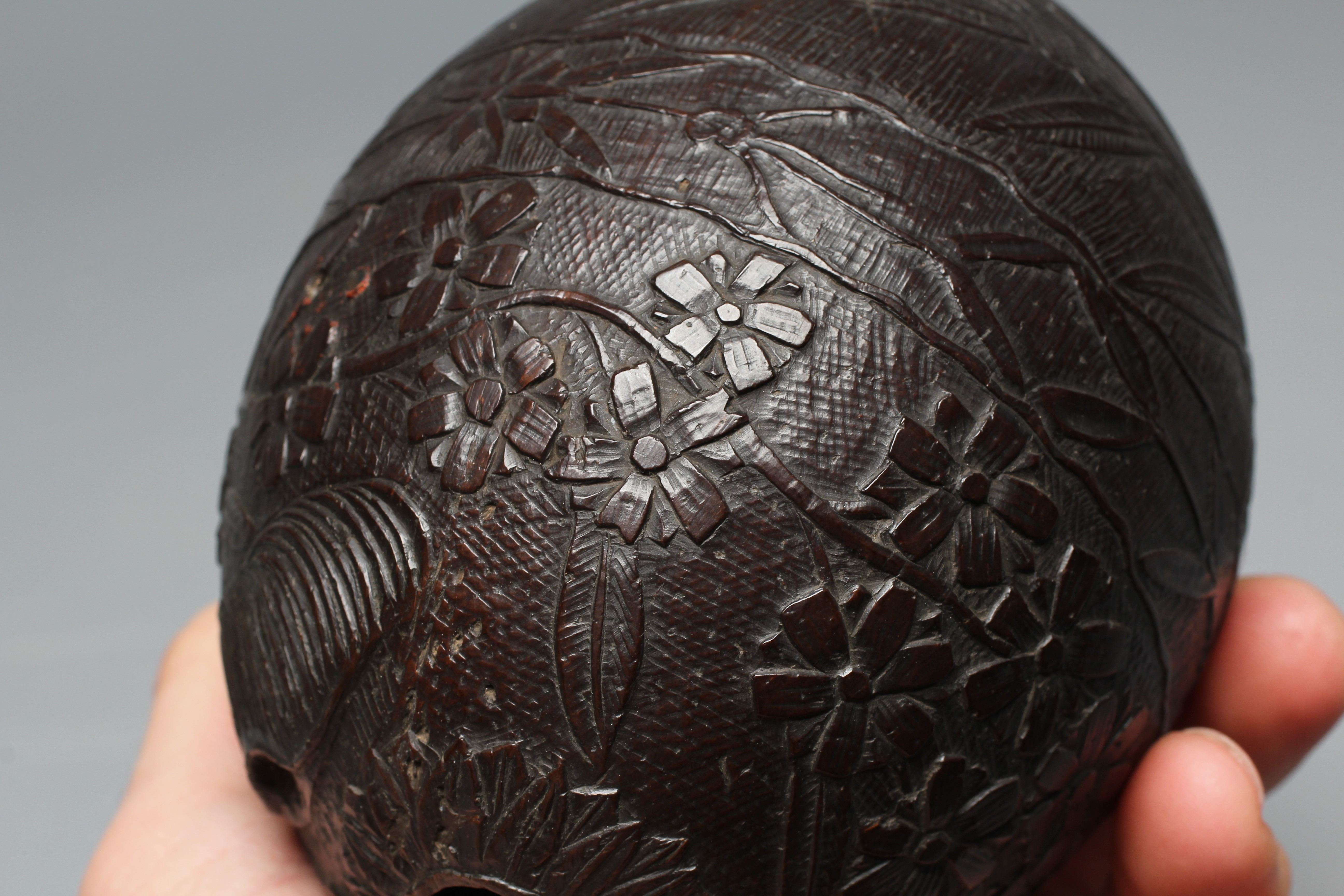 A NAPOLEONIC BUGBEAR COCONUT FLASK, early 19th century, incise carved with crossed swords, Imperial Image