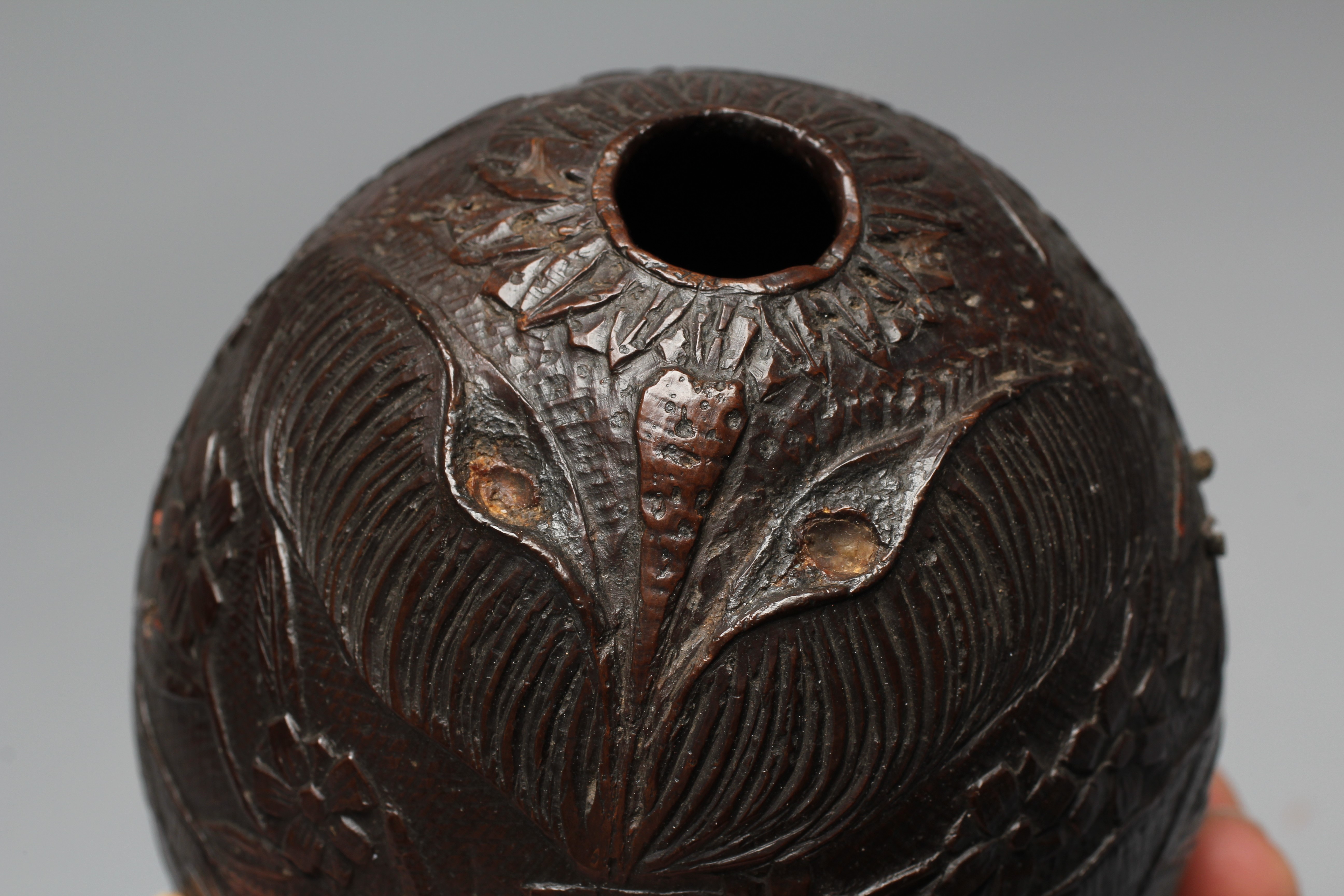 A NAPOLEONIC BUGBEAR COCONUT FLASK, early 19th century, incise carved with crossed swords, Imperial Image