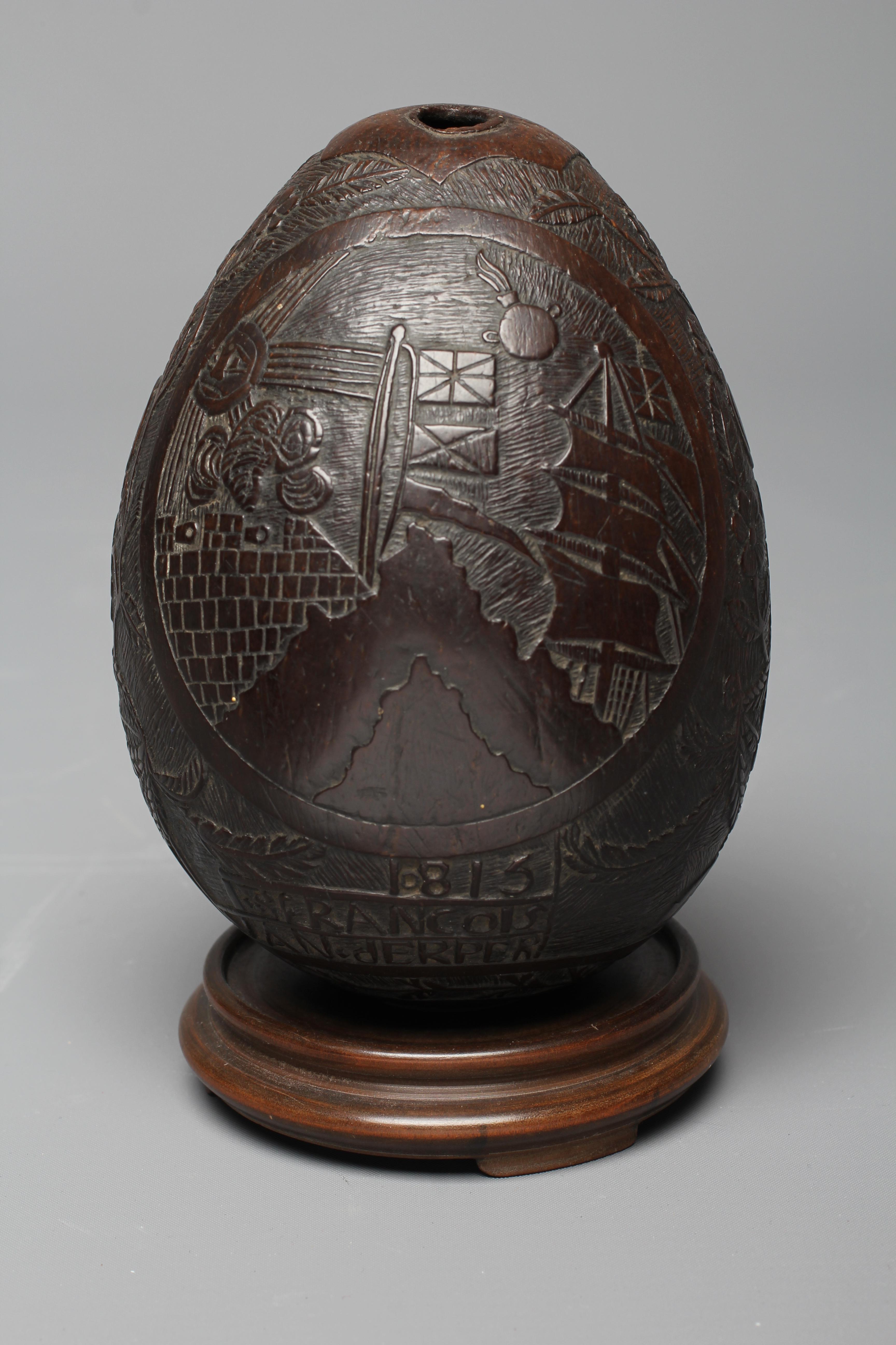 A NAPOLEONIC BUGBEAR COCONUT FLASK Image