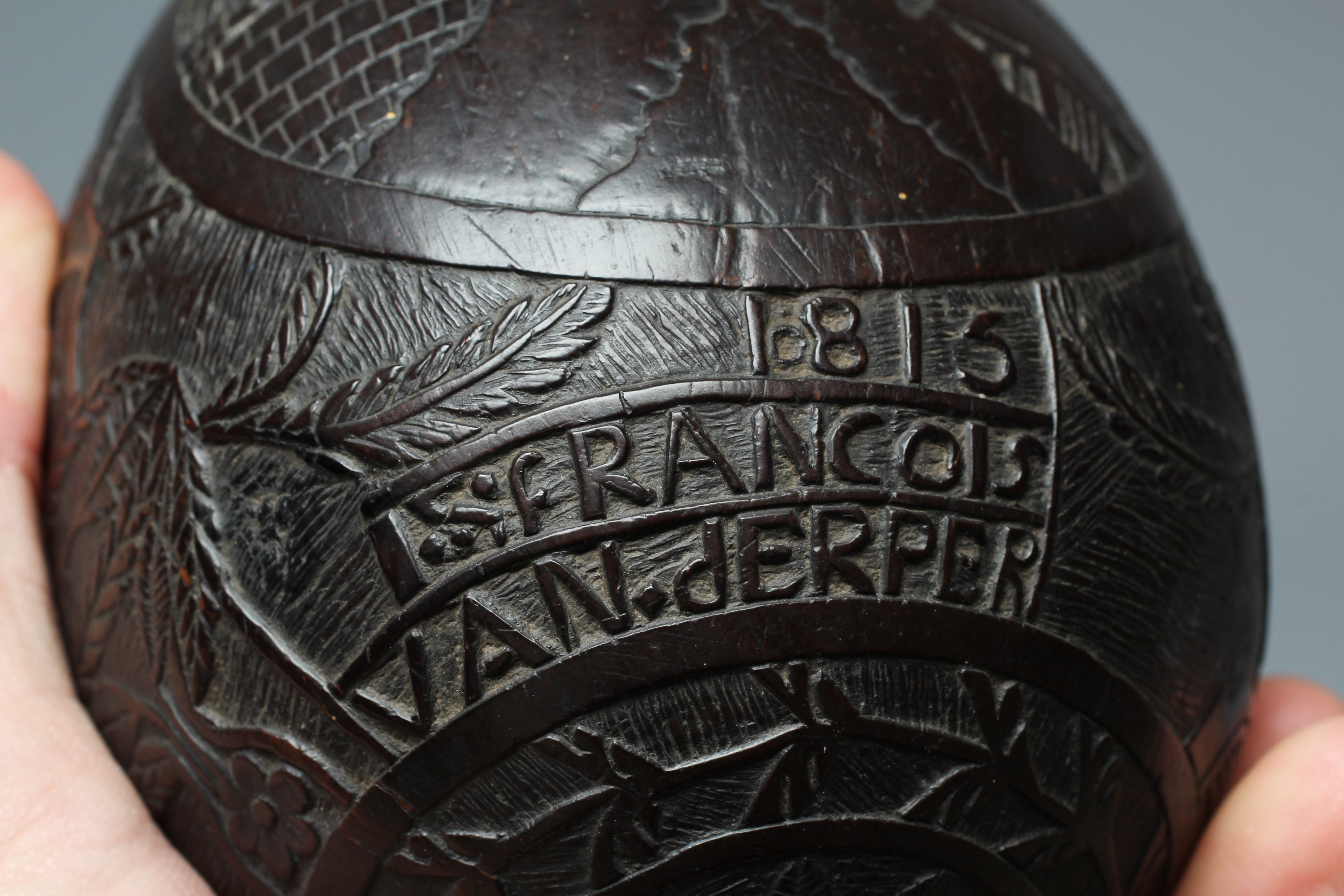 A NAPOLEONIC BUGBEAR COCONUT FLASK Image
