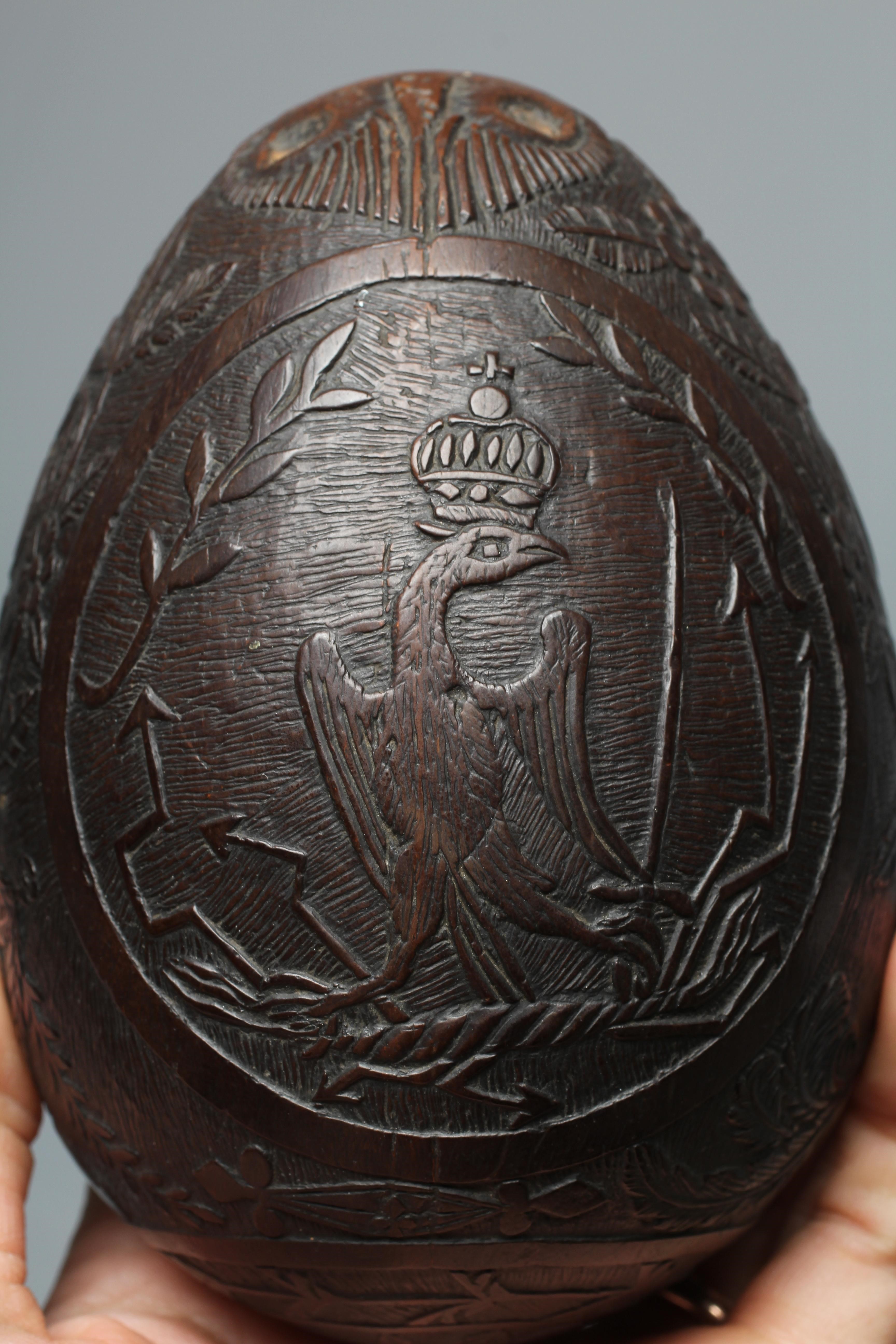A NAPOLEONIC BUGBEAR COCONUT FLASK Image