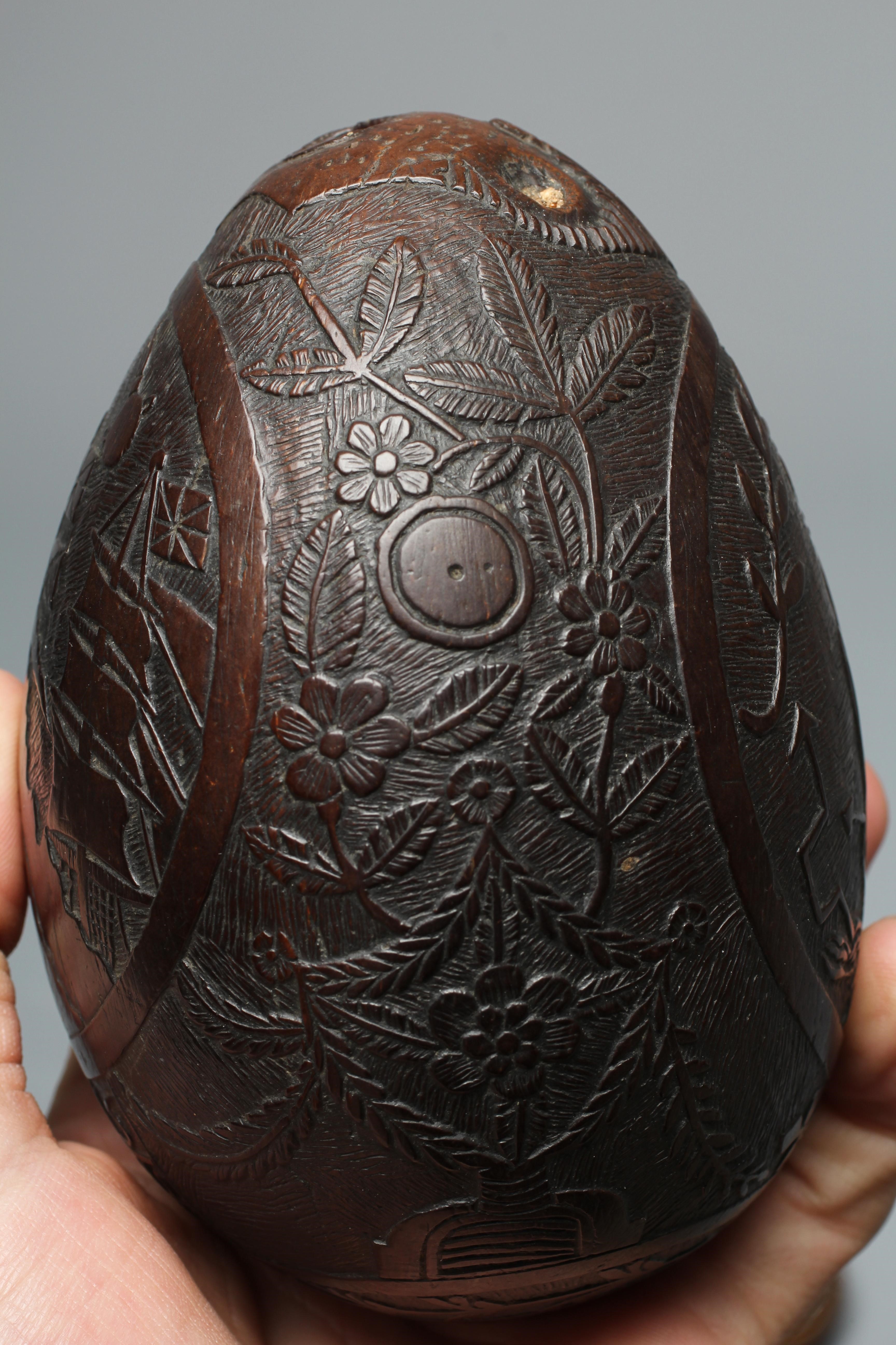 A NAPOLEONIC BUGBEAR COCONUT FLASK Image