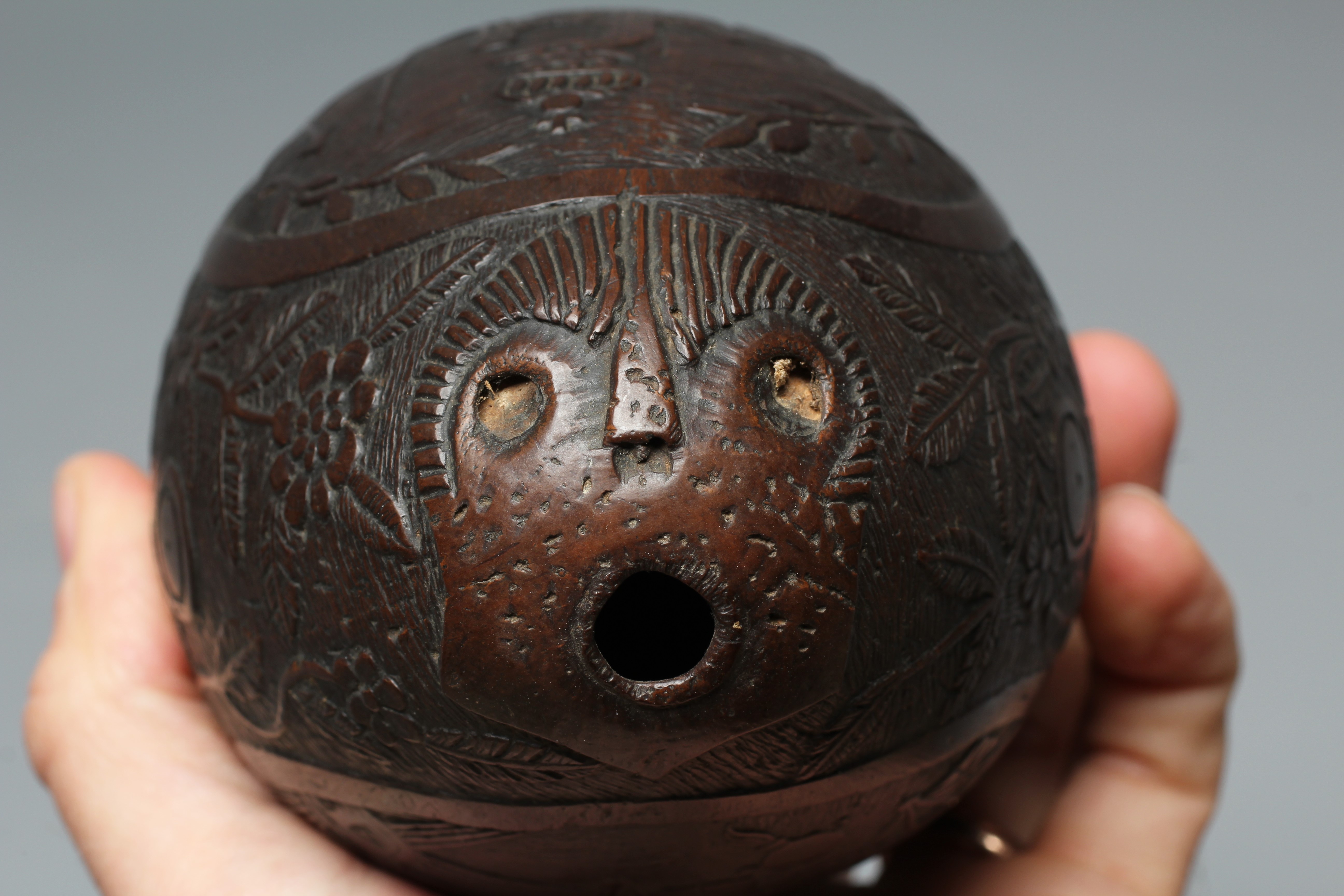 A NAPOLEONIC BUGBEAR COCONUT FLASK Image