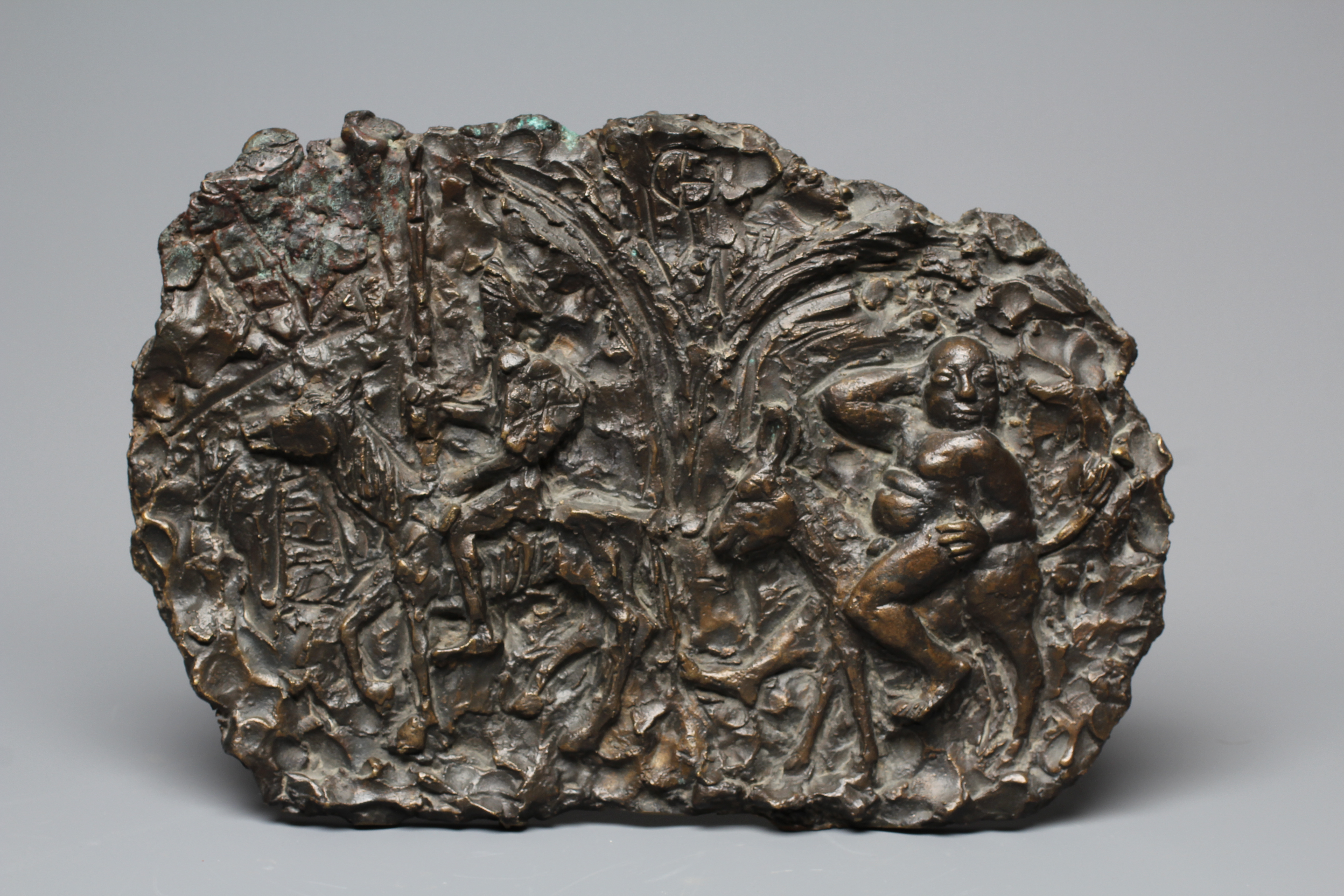 A 20TH CENTURY CONTINENTAL BRONZE PLAQUE OF DON QUIXOTE, indistinctly signed verso, with a dark Image