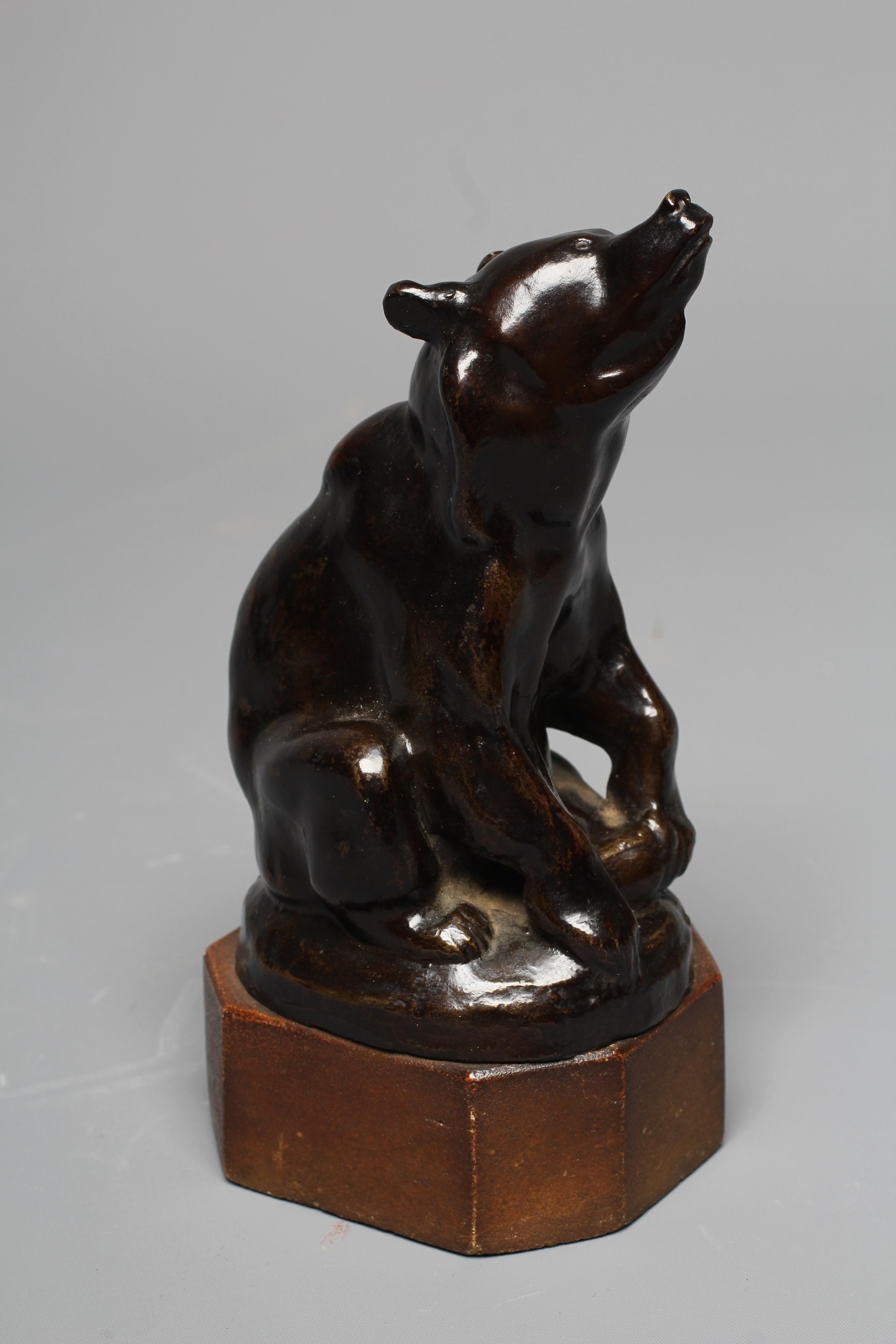 OTTO WEISMULLER (1892-1974) Seated Bear, bronze with dark brown patina, signed, on a stone plinth, Image