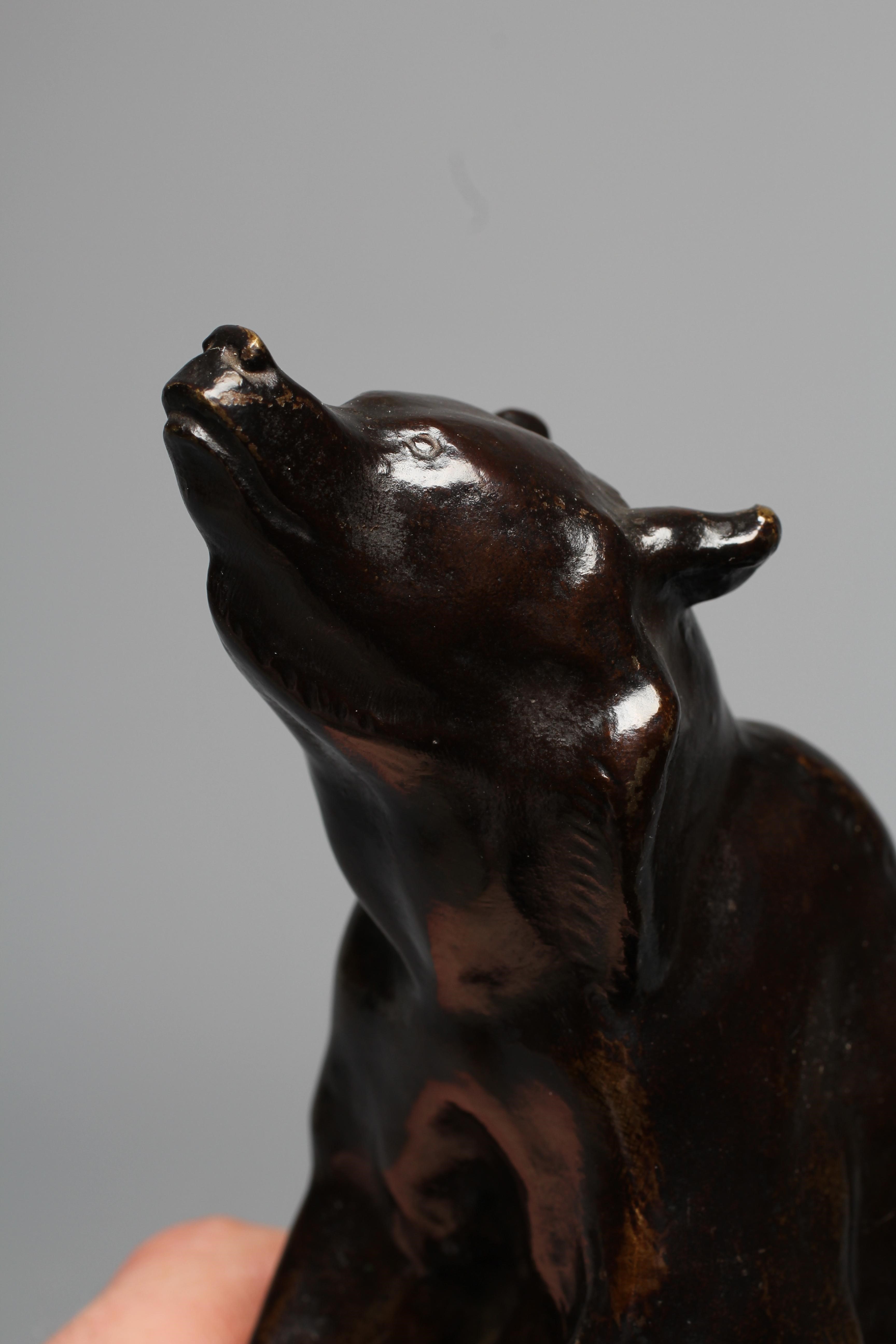 OTTO WEISMULLER (1892-1974) Seated Bear, bronze with dark brown patina, signed, on a stone plinth, Image