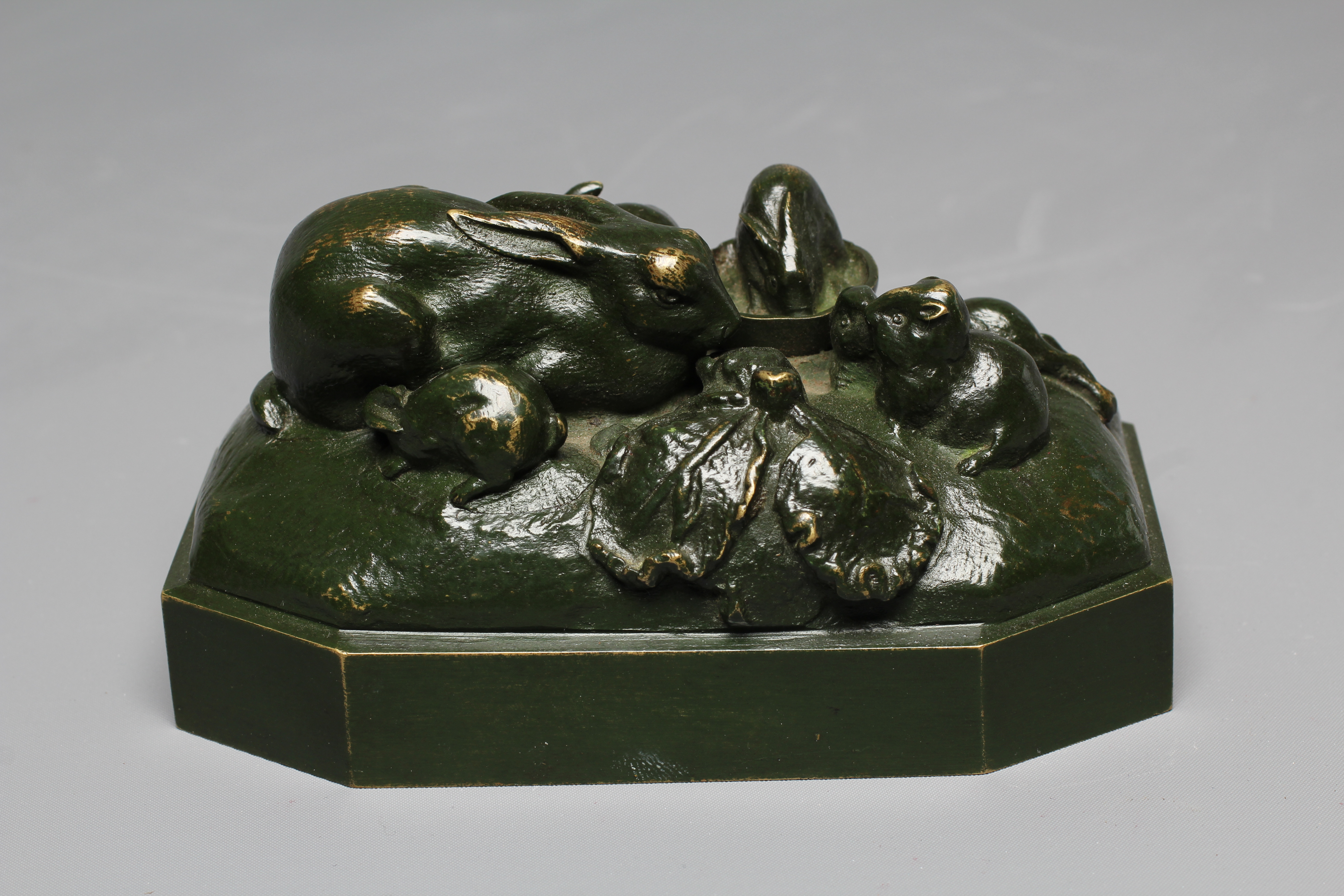 A 20TH CENTURY BRONZE OF A RABBIT FAMILY with dark green patina, 3" high Image