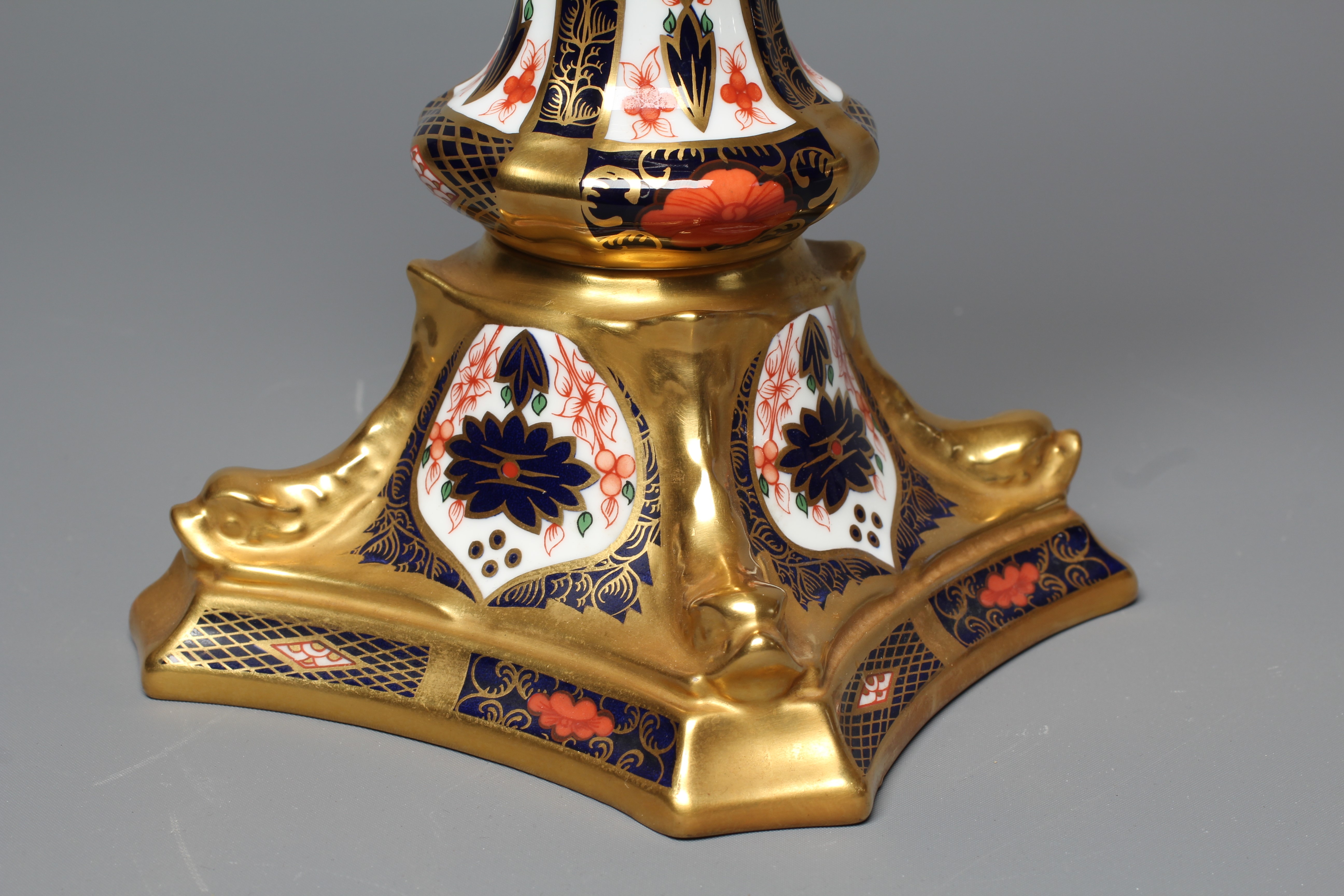 A ROYAL CROWN DERBY IMARI PATTERN LARGE CANDLESTICK, 1986, iron red printed 1128 mark, 10 3/4" high Image