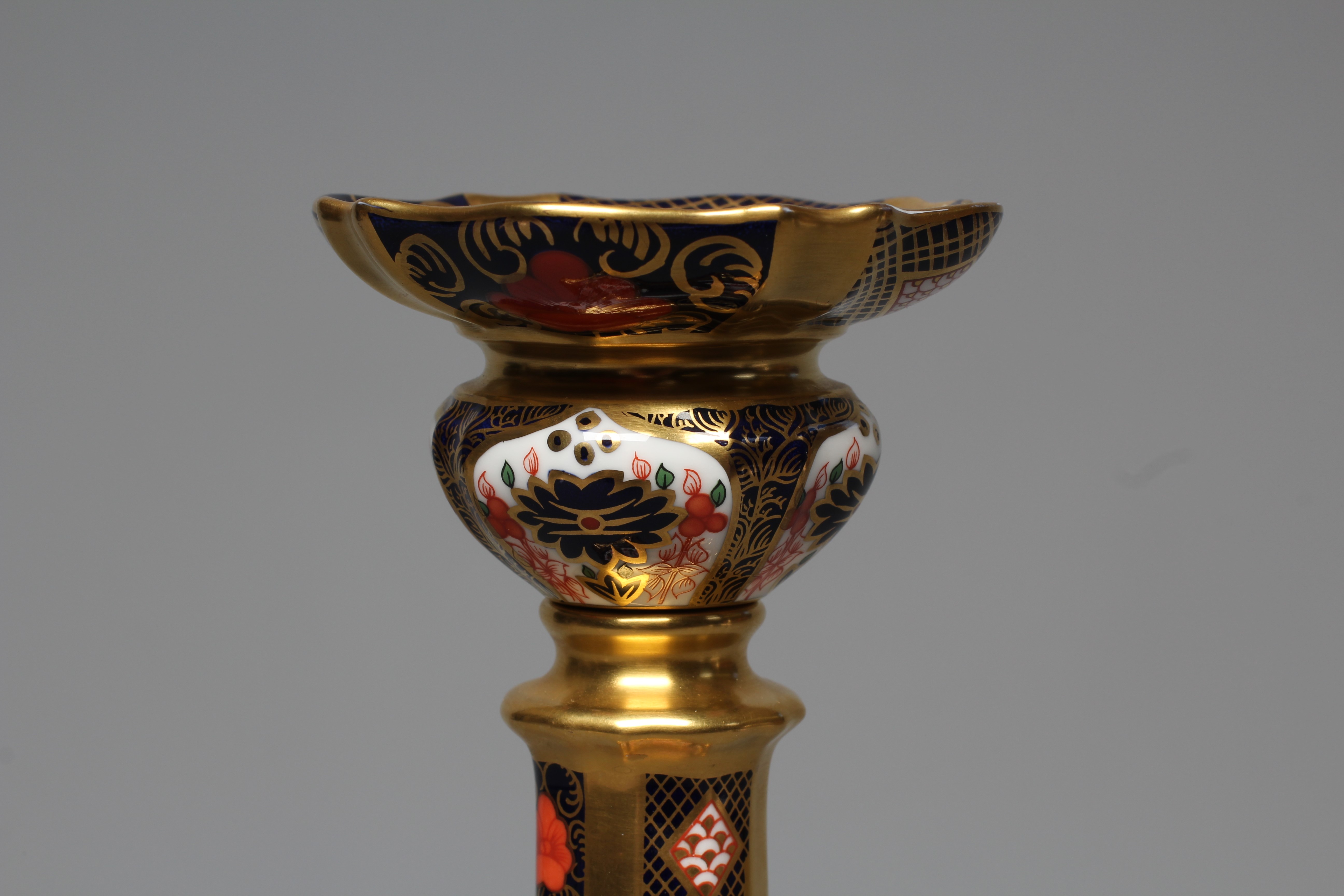 A ROYAL CROWN DERBY IMARI PATTERN LARGE CANDLESTICK, 1986, iron red printed 1128 mark, 10 3/4" high Image