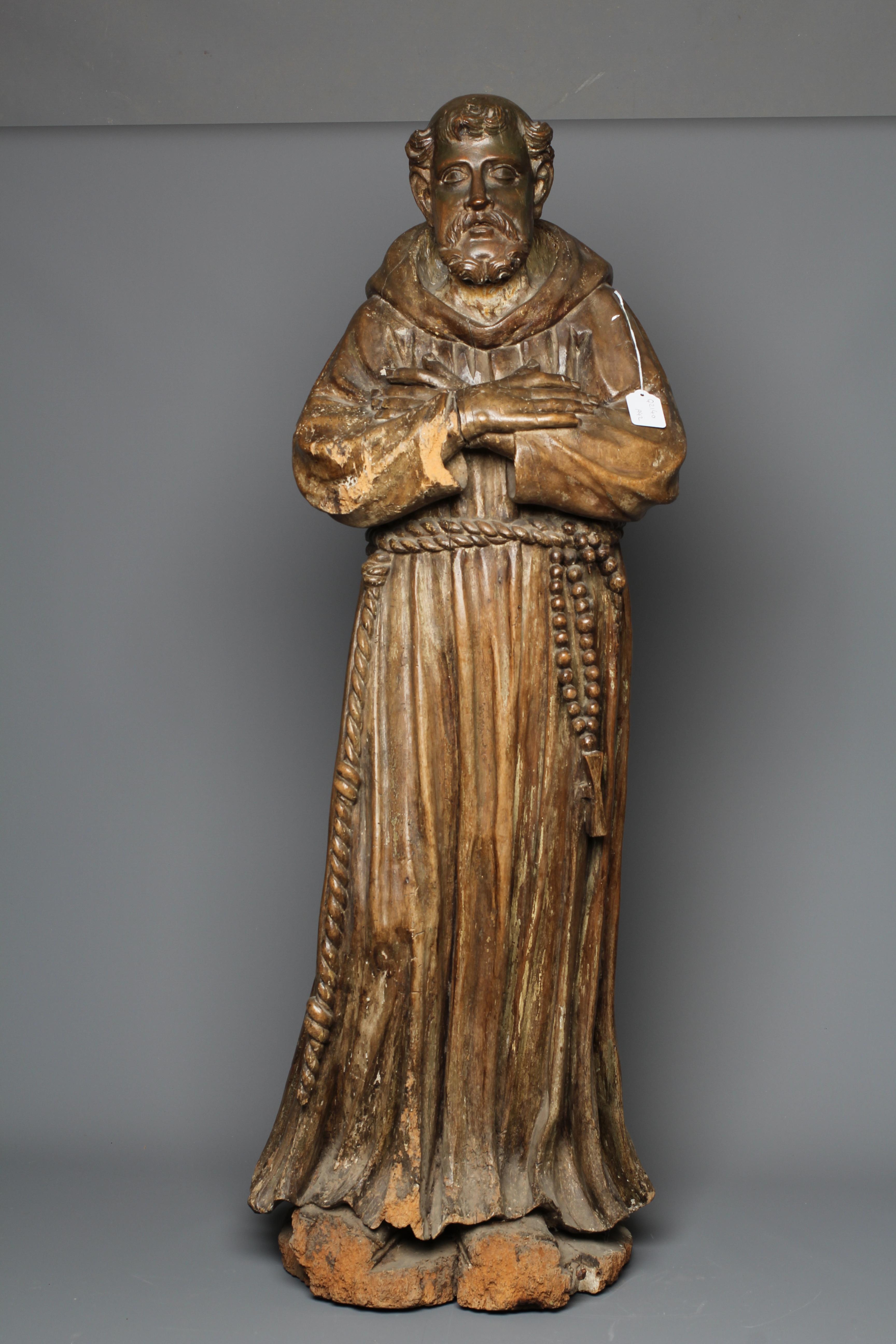 A CONTINENTAL CARVED OAK FIGURE OF A SAINT Image