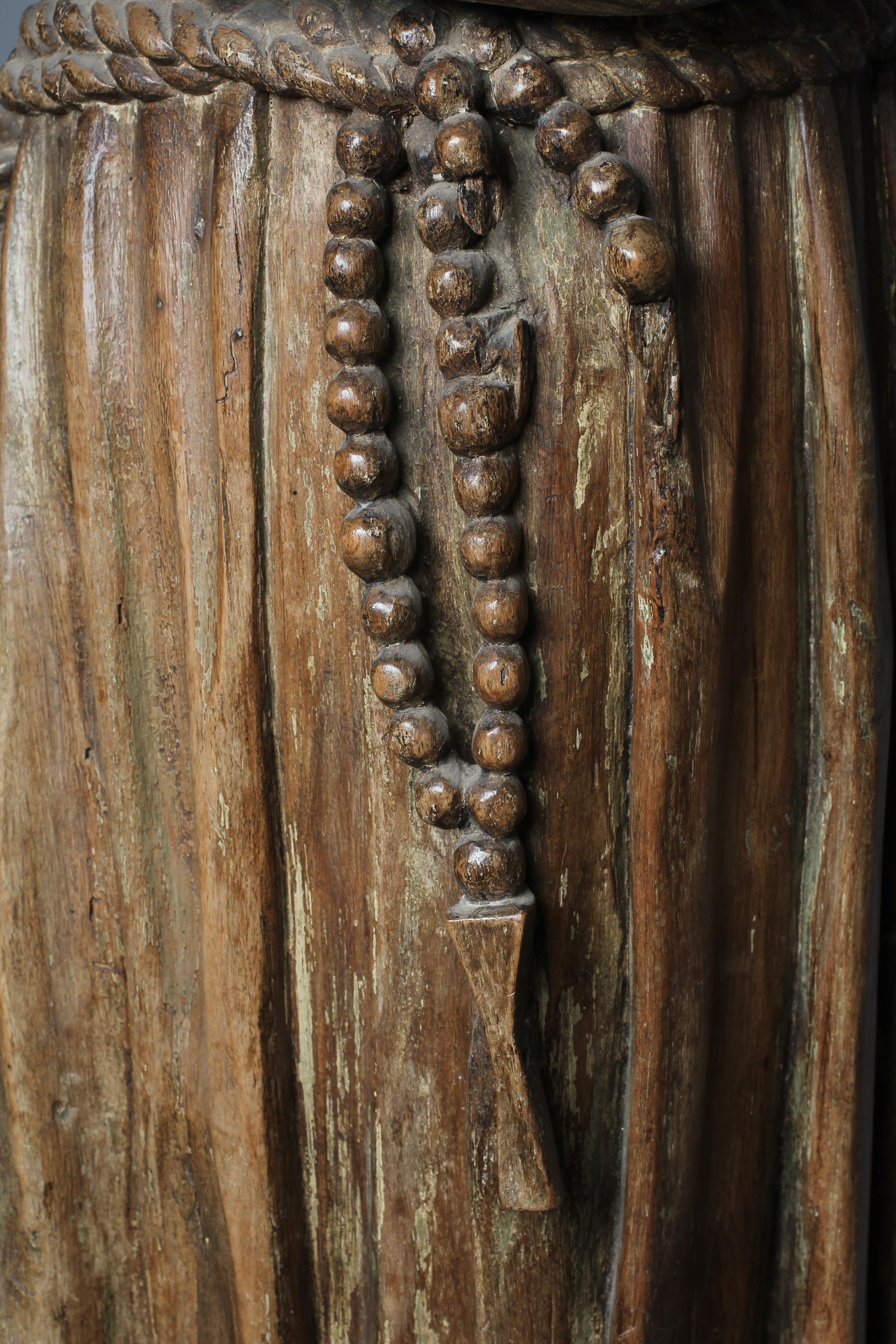 A CONTINENTAL CARVED OAK FIGURE OF A SAINT Image