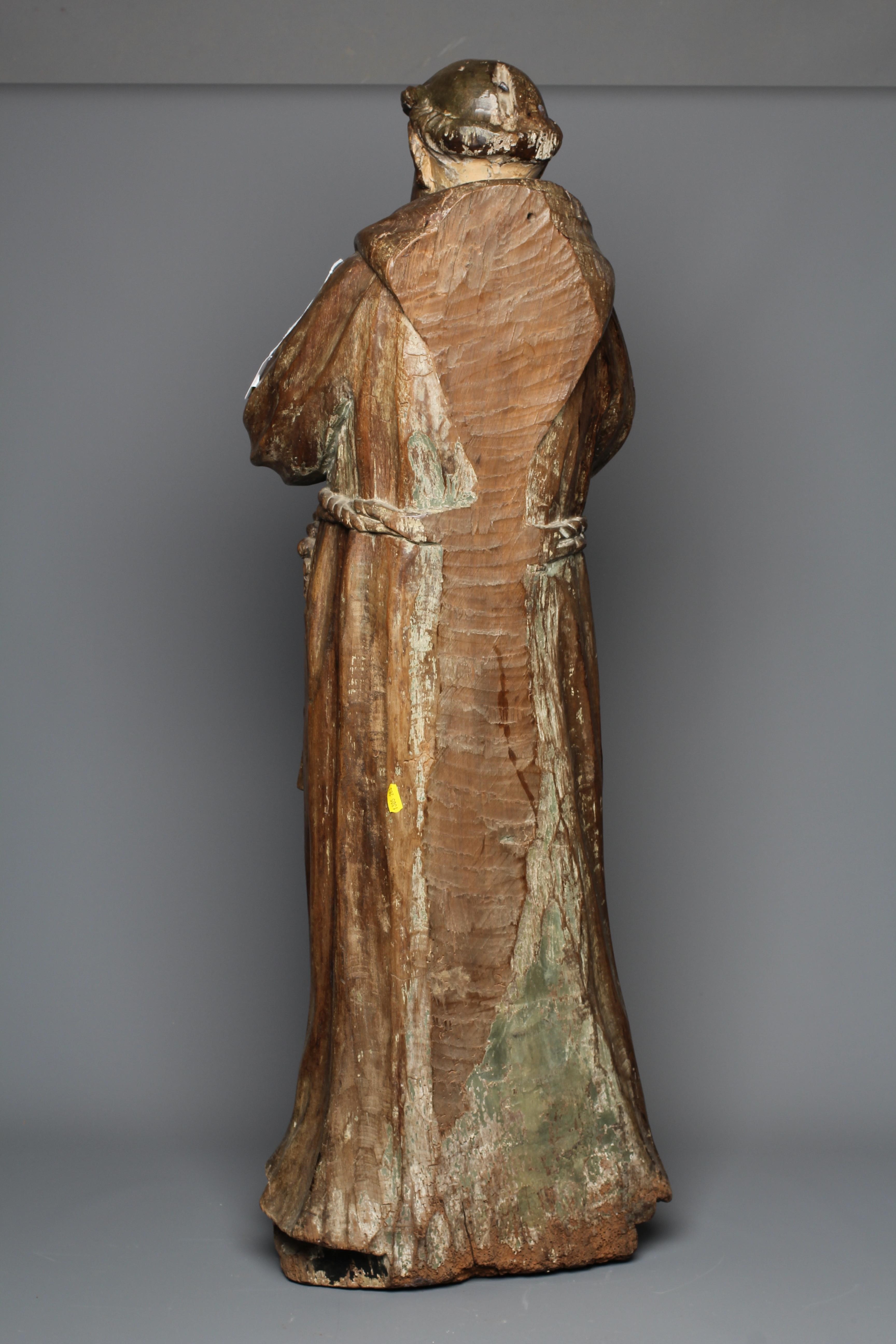 A CONTINENTAL CARVED OAK FIGURE OF A SAINT Image
