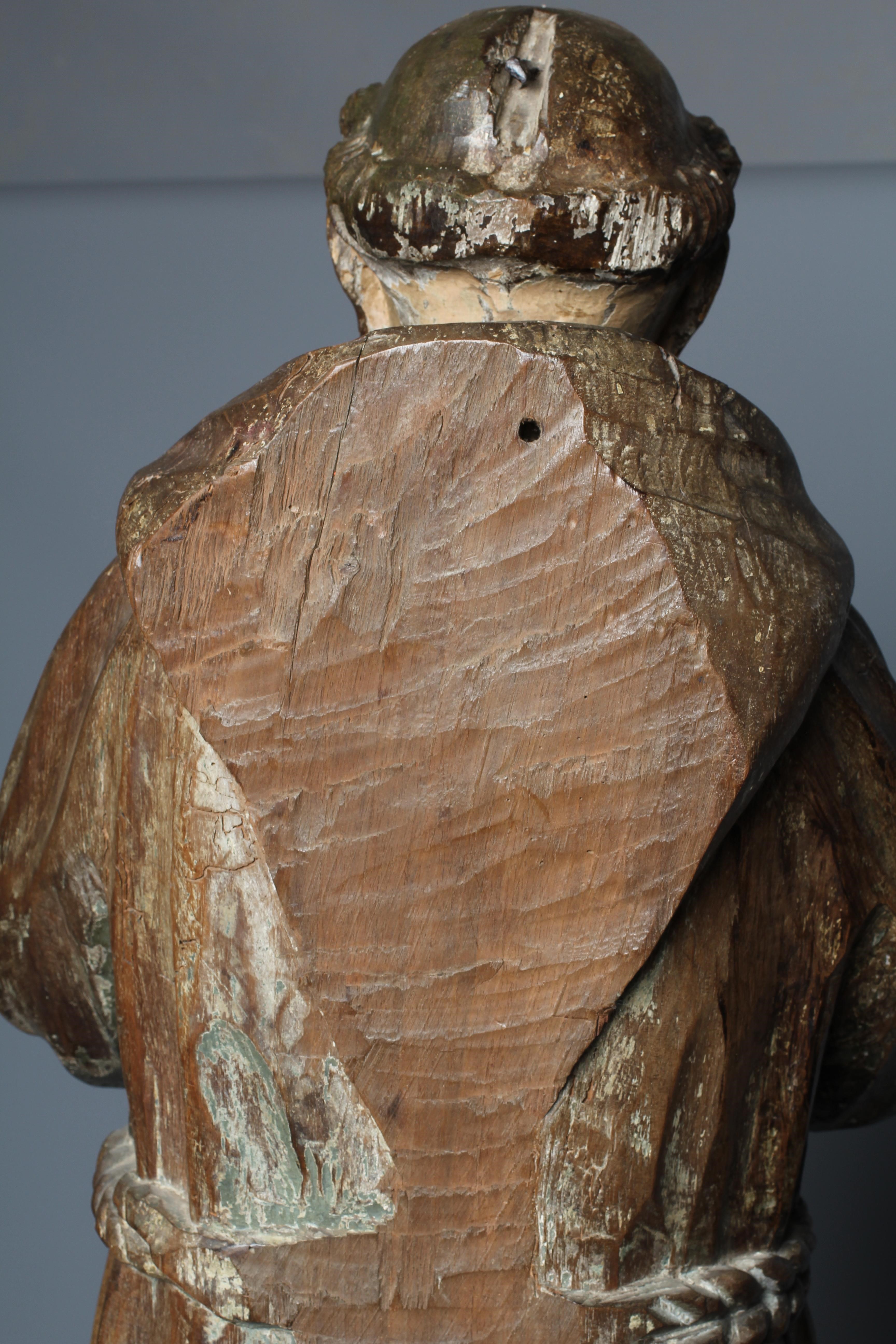 A CONTINENTAL CARVED OAK FIGURE OF A SAINT Image