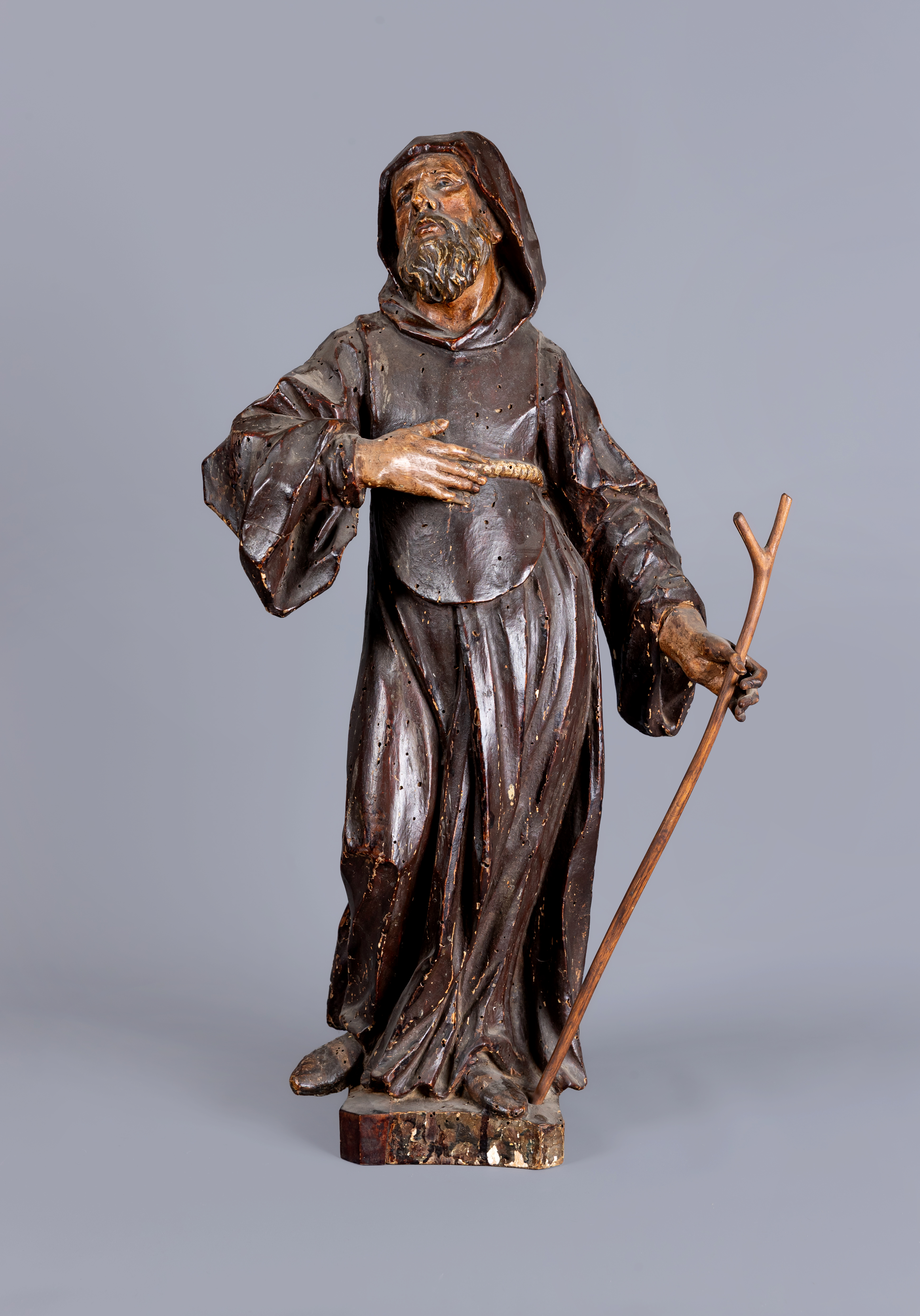 A CONTINENTAL SCHOOL PAINTED WOOD CARVED FIGURE OF A SAINT, possibly 18th century, full length Image