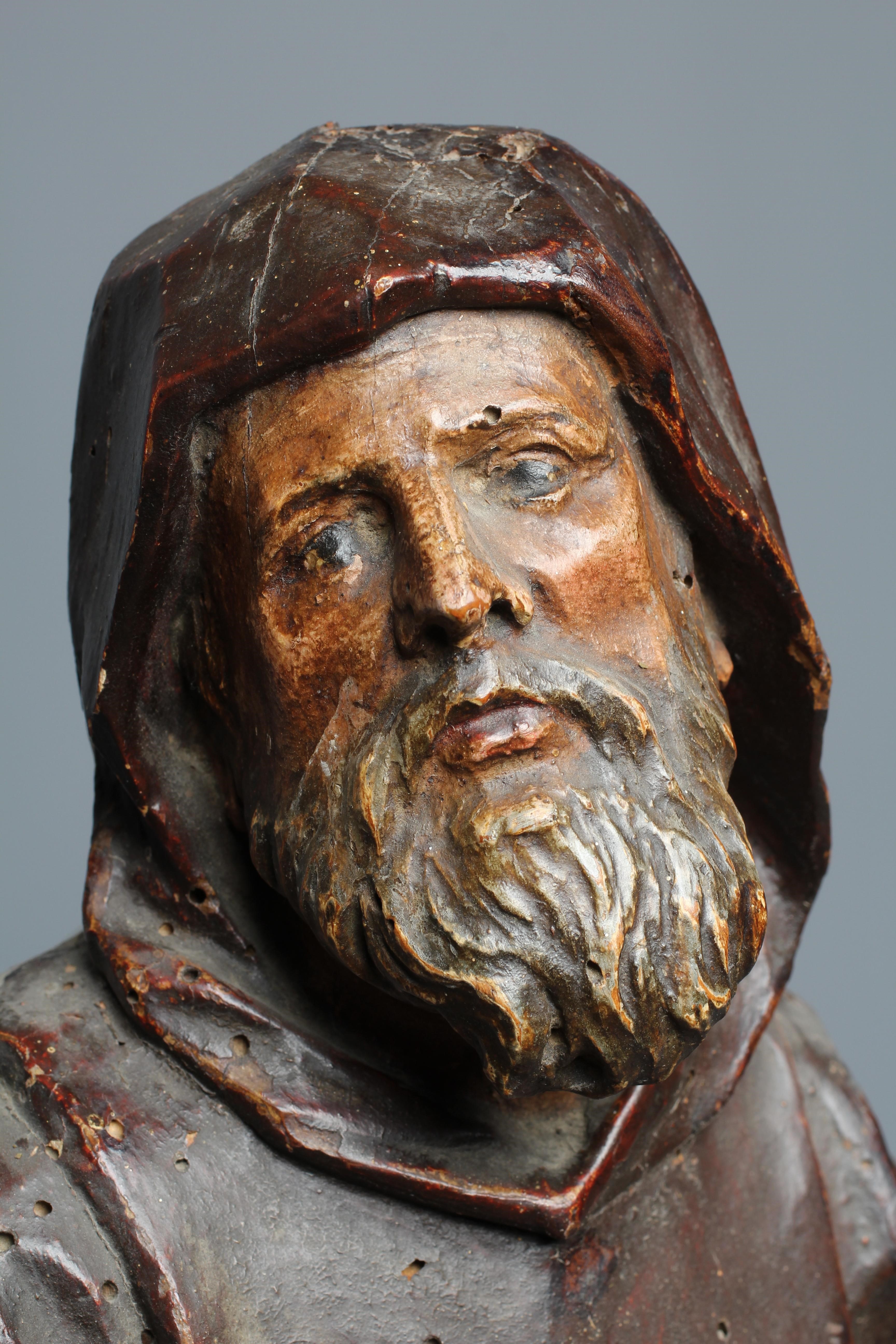 A CONTINENTAL SCHOOL PAINTED WOOD CARVED FIGURE OF A SAINT, possibly 18th century, full length Image
