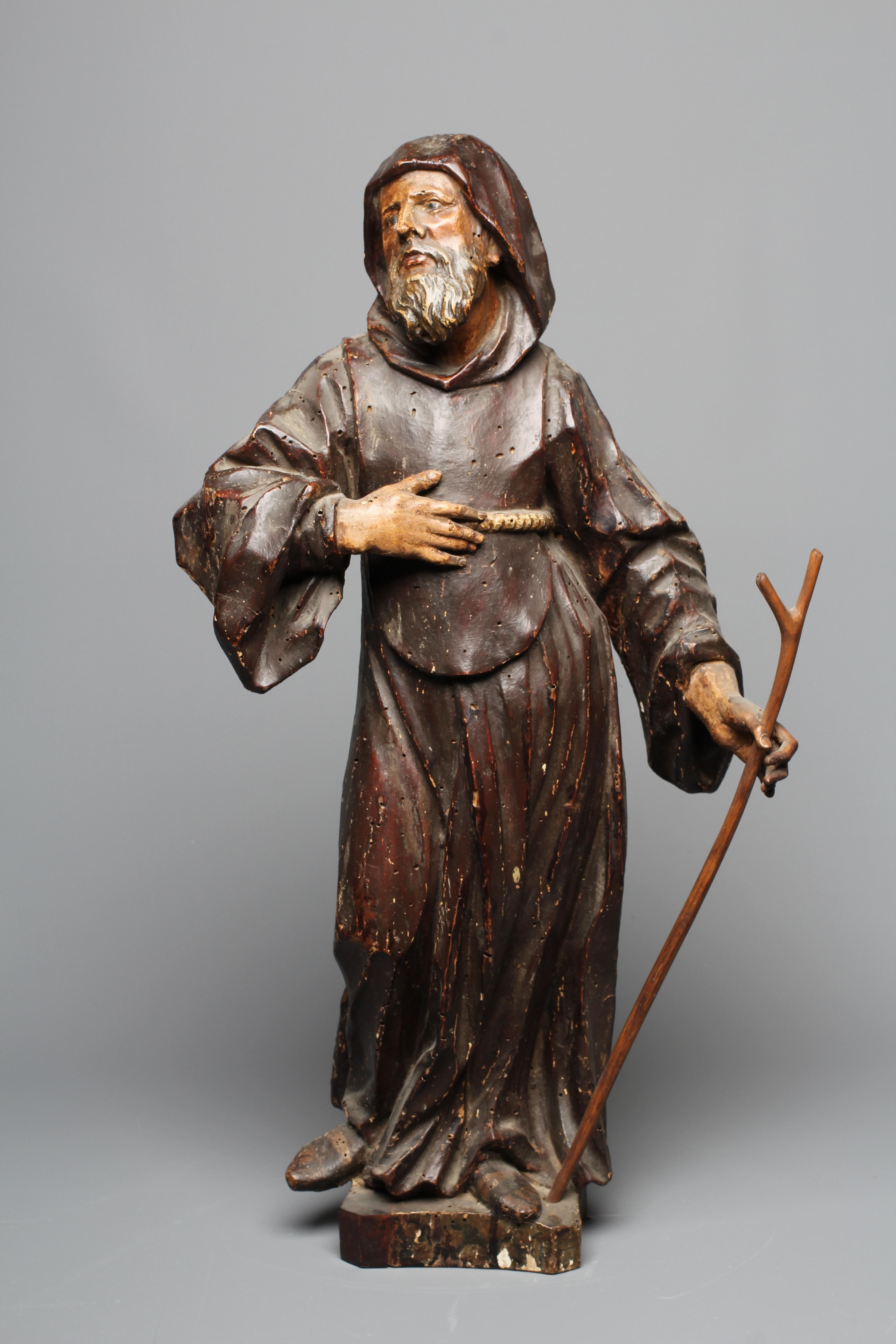 A CONTINENTAL SCHOOL PAINTED WOOD CARVED FIGURE OF A SAINT, possibly 18th century, full length Image