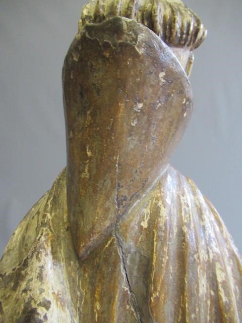 A CARVED WOOD AND PAINTED FIGURE OF ST ANTHONY OF PADUA, 17th century, modelled standing and with a Image