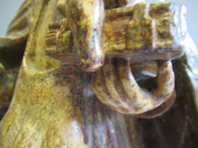 A CARVED WOOD AND PAINTED FIGURE OF ST ANTHONY OF PADUA, 17th century, modelled standing and with a Image