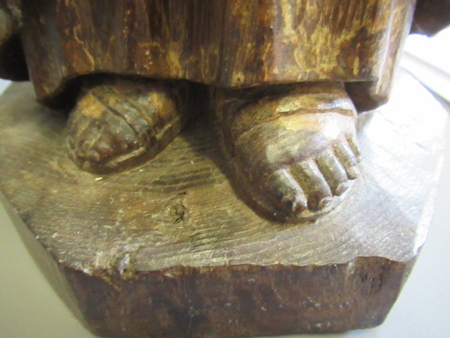 A CARVED WOOD AND PAINTED FIGURE OF ST ANTHONY OF PADUA, 17th century, modelled standing and with a Image