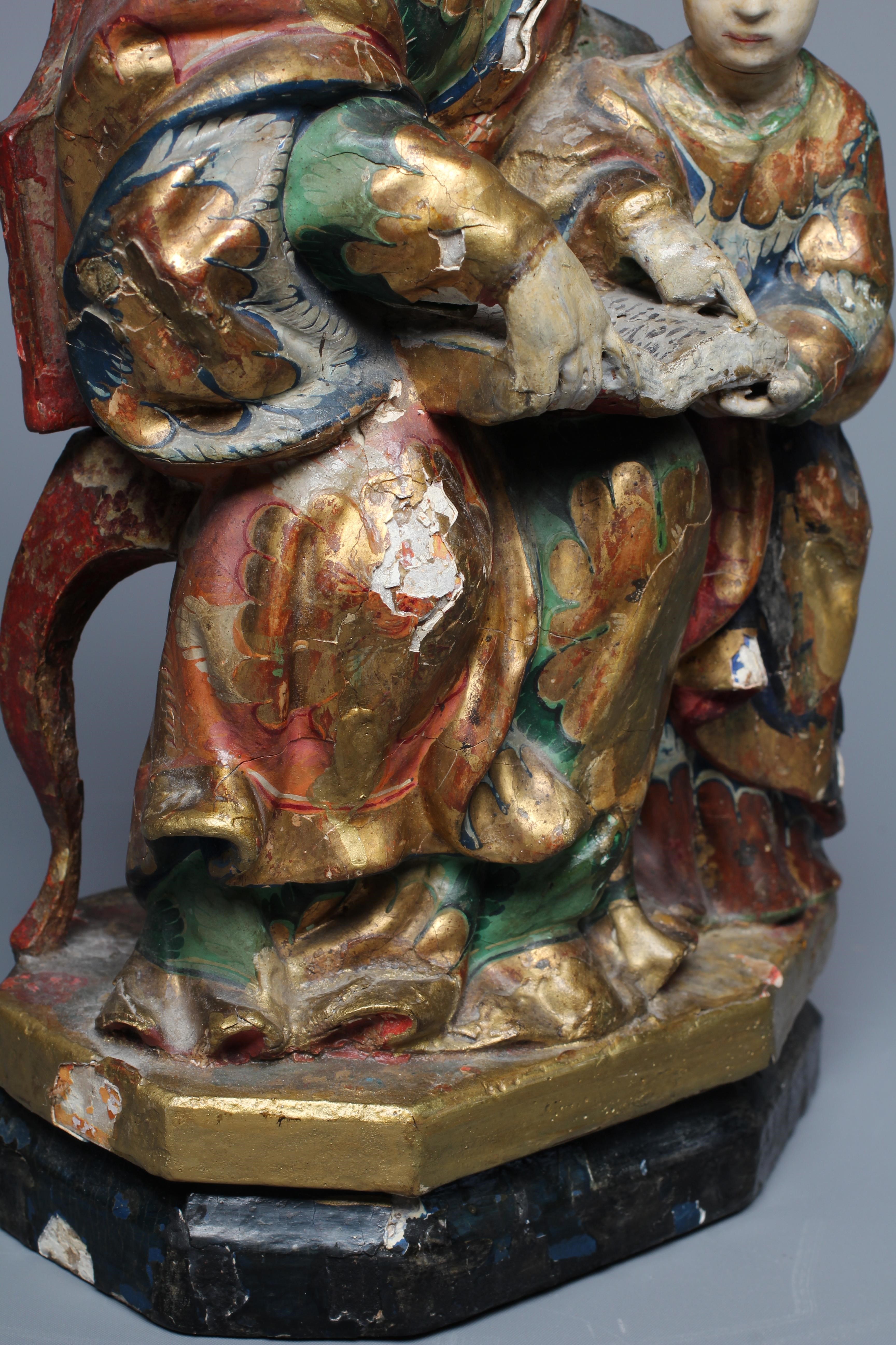 AN 18TH CENTURY CARVED WOOD AND POLYCHROME DECORATED FIGURE OF ST ANN AND THE VIRGIN Image