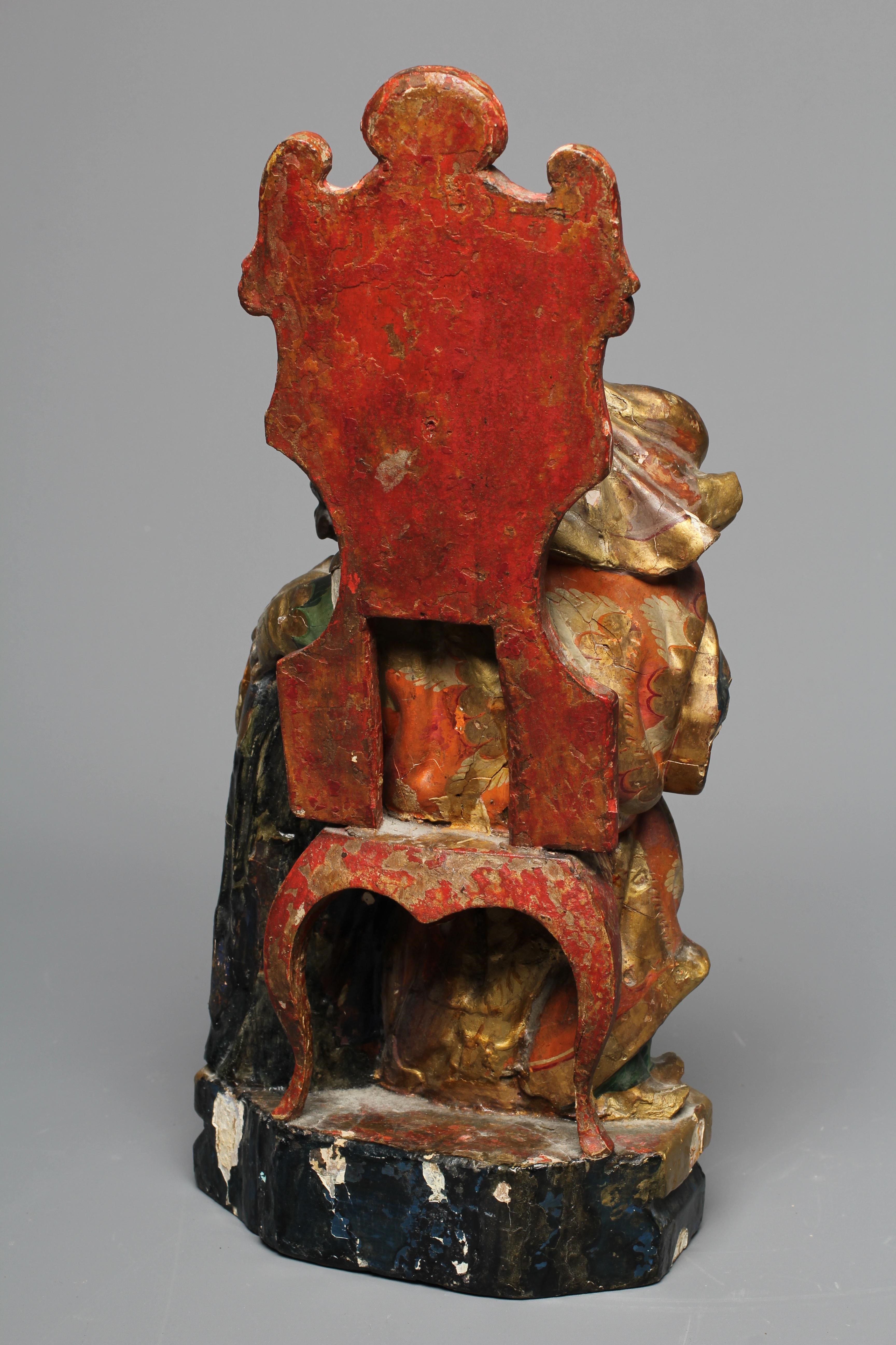 AN 18TH CENTURY CARVED WOOD AND POLYCHROME DECORATED FIGURE OF ST ANN AND THE VIRGIN Image