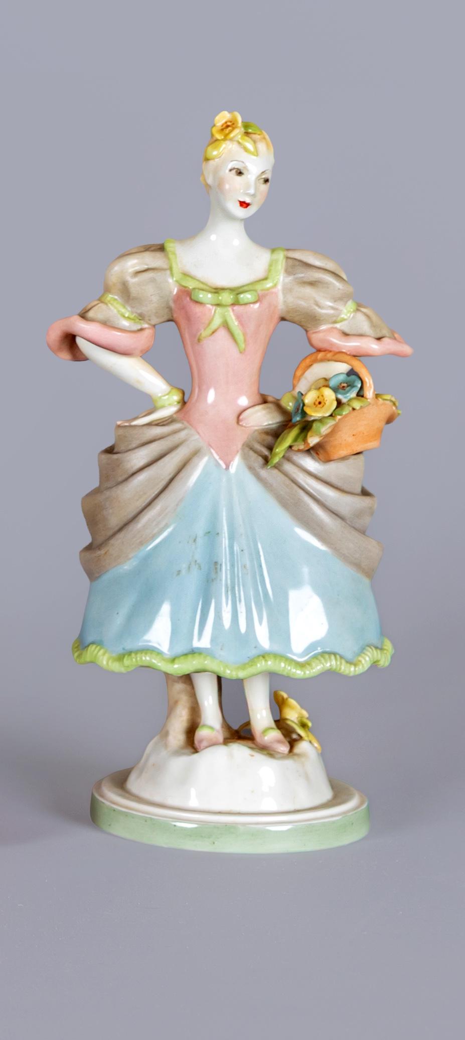 AGNES PINDER DAVIS FOR ROYAL WORCESTER - A Watteau figure of a young female flower seller Image
