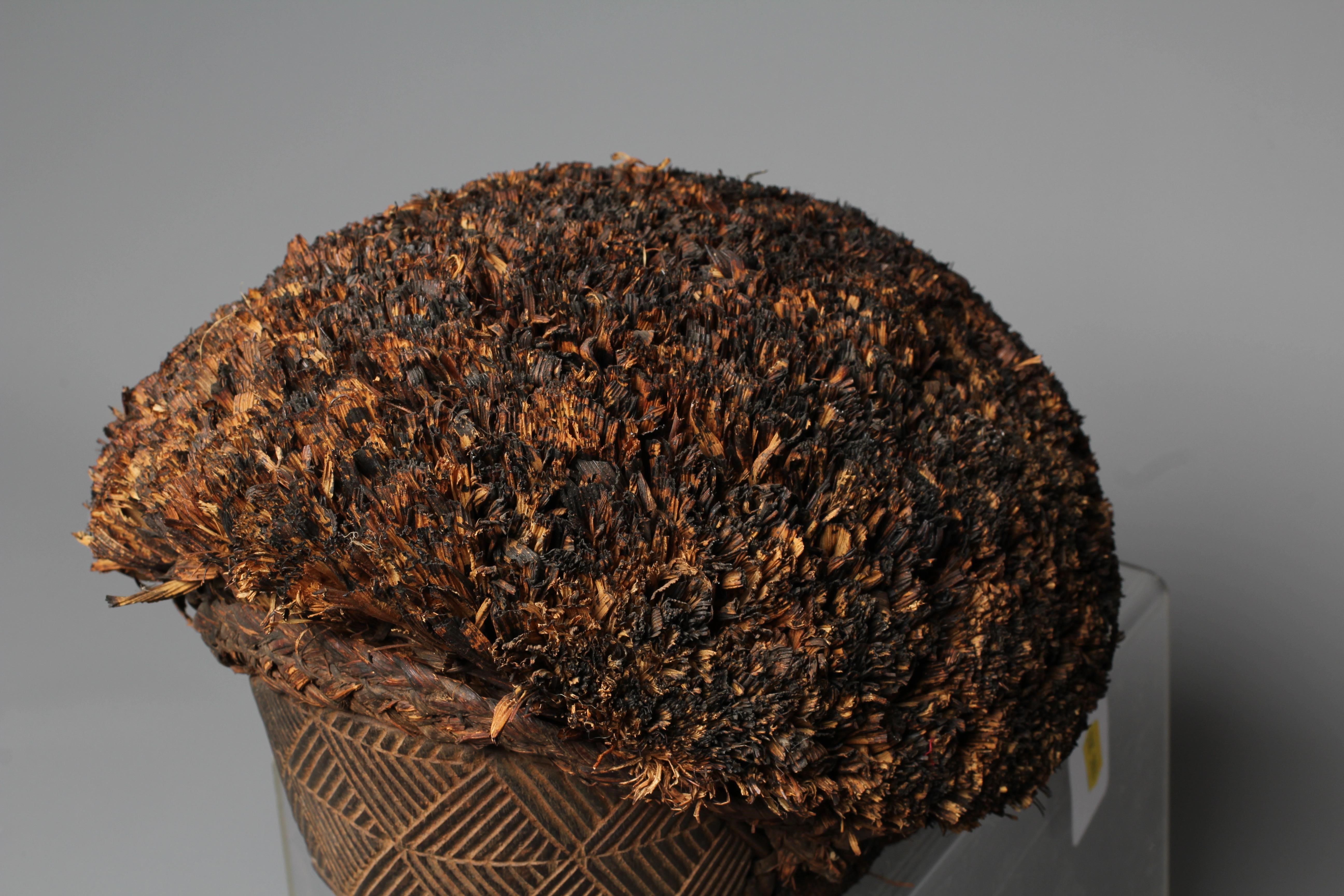 A CHOKWE OVAL MASK, Angola/Congo, with fibre hair and beard and geometric decoration in relief to Image