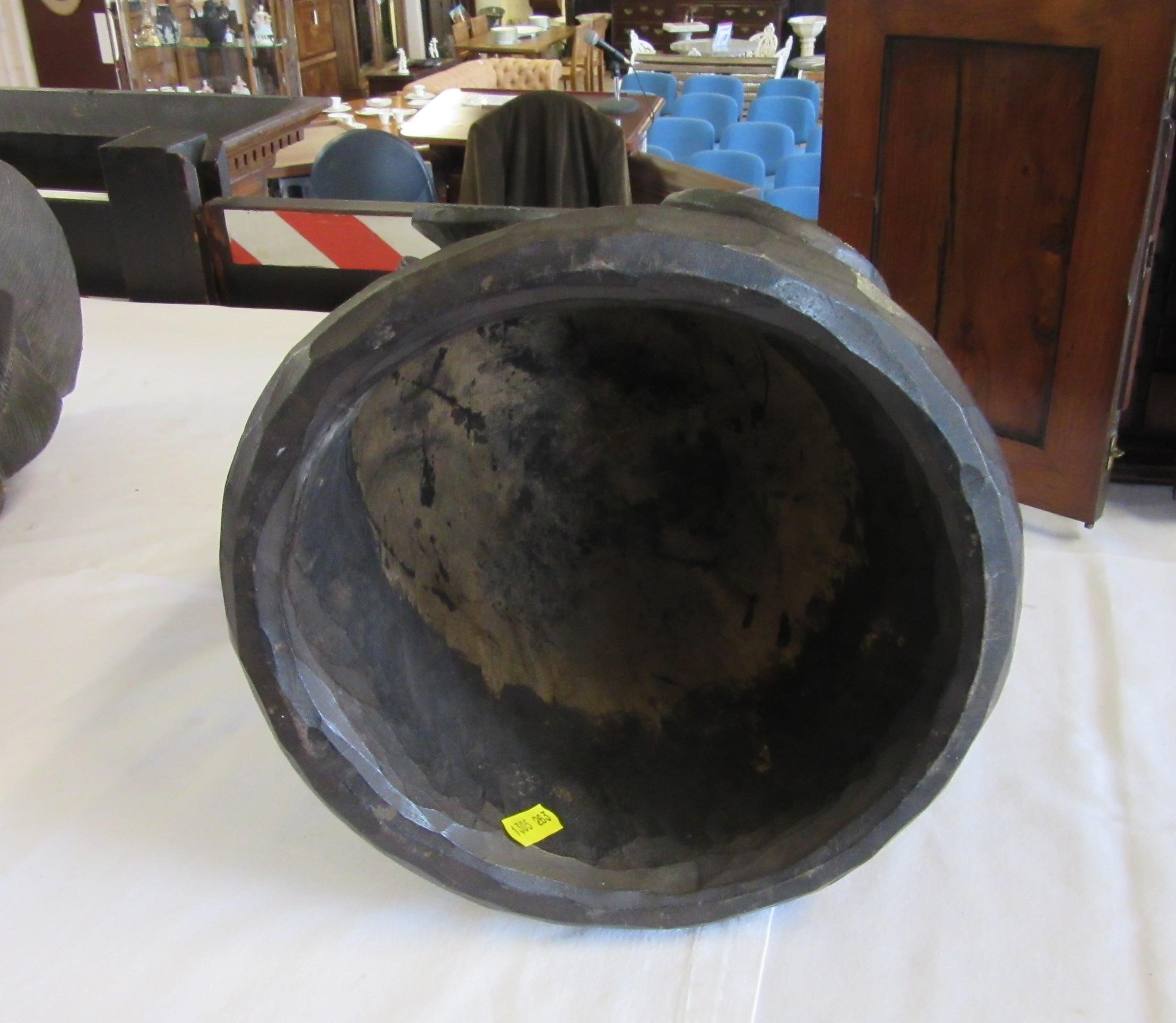 A MENDE HELMET MASK, Sierra Leone, heavily carved wood, 13 1/2", together with another Mende helmet Image