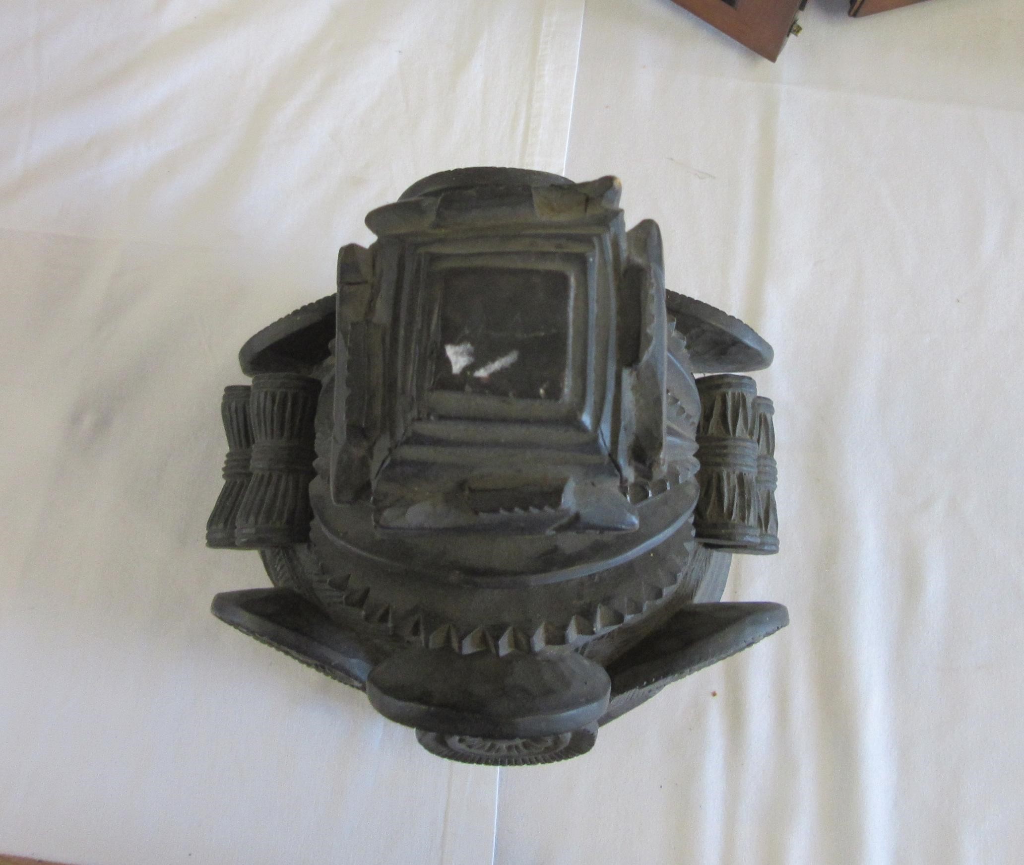 A MENDE HELMET MASK, Sierra Leone, heavily carved wood, 13 1/2", together with another Mende helmet Image
