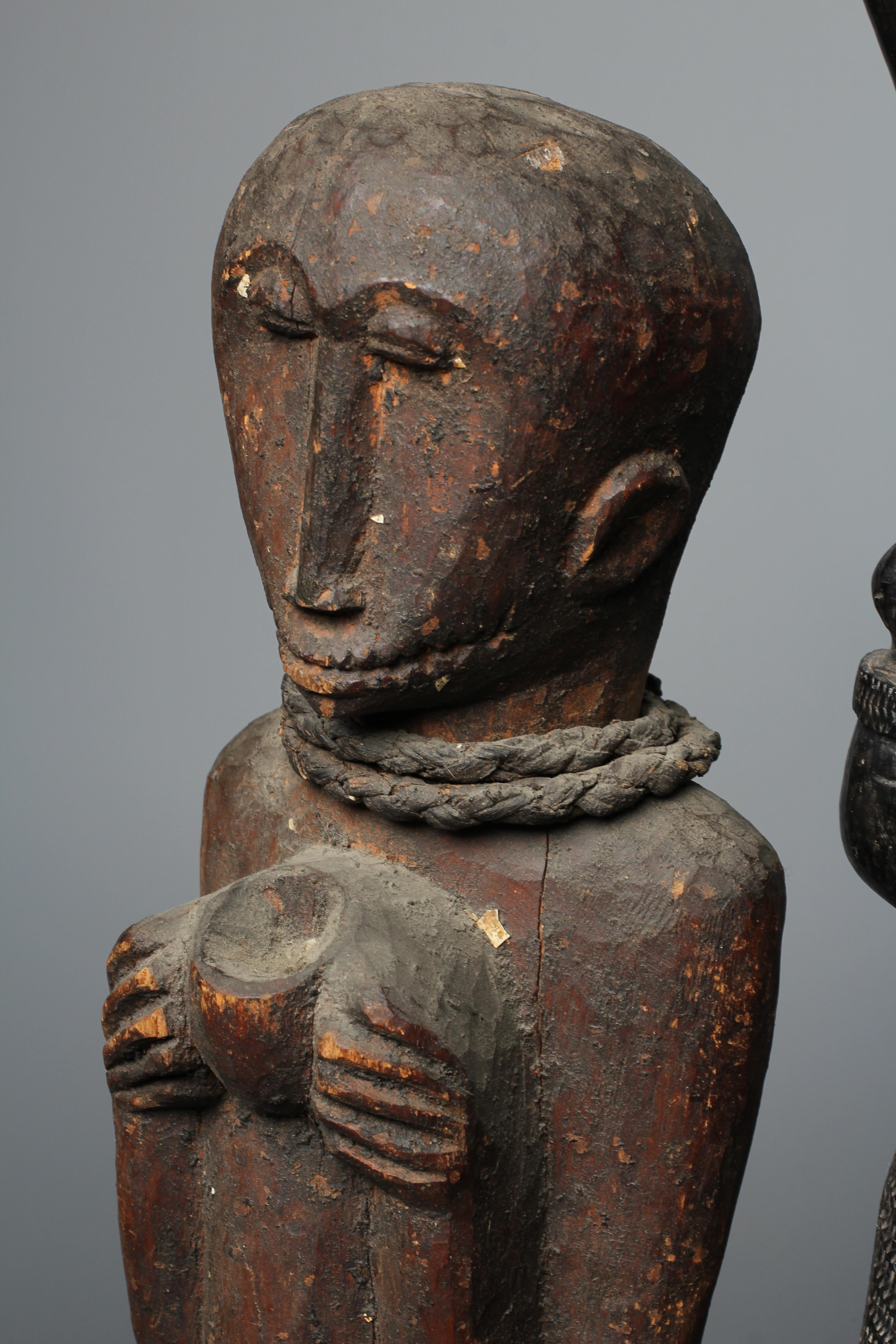 FOUR AFRICAN CARVED WOOD SCULPTURES Image