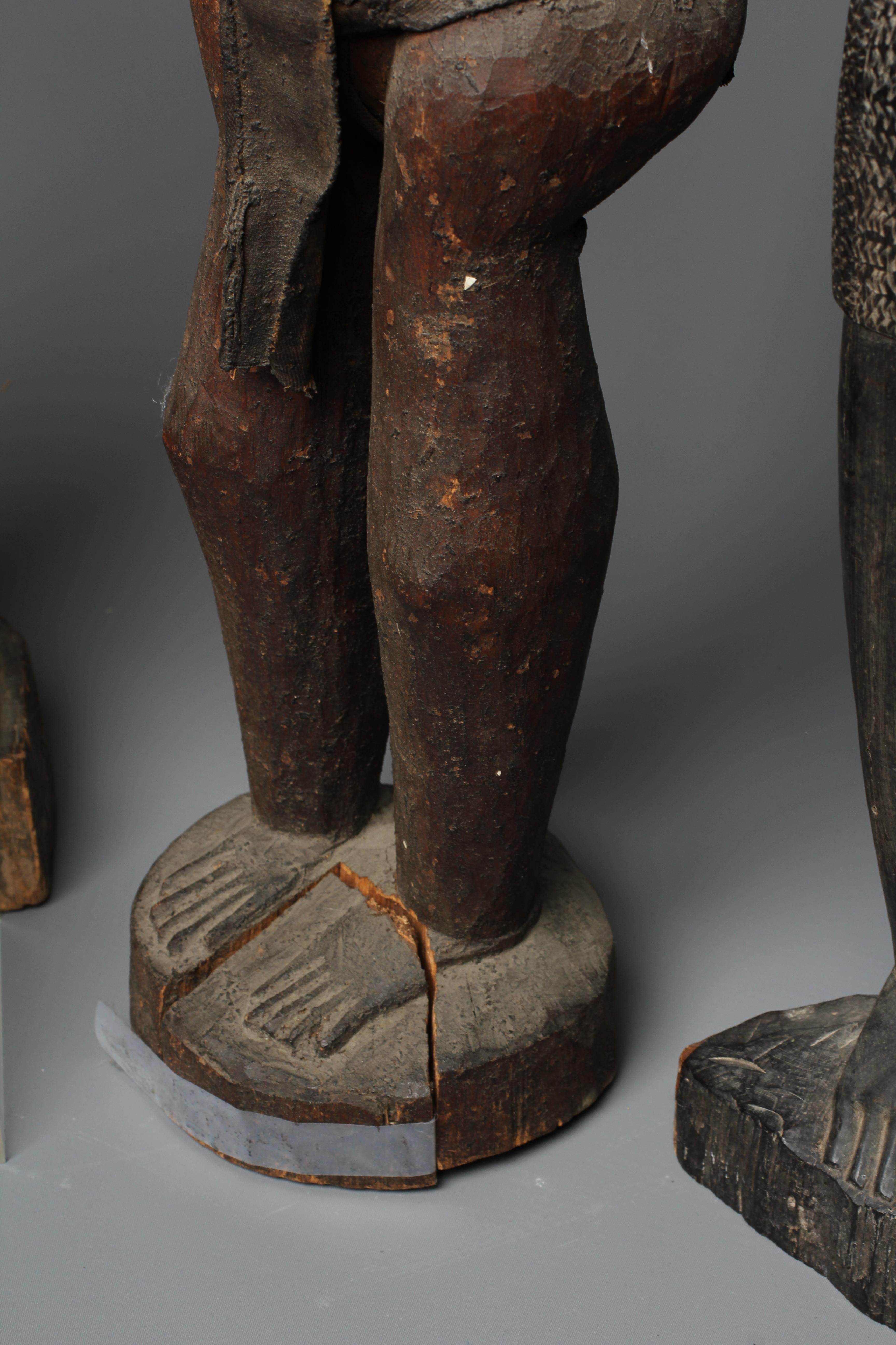 FOUR AFRICAN CARVED WOOD SCULPTURES Image