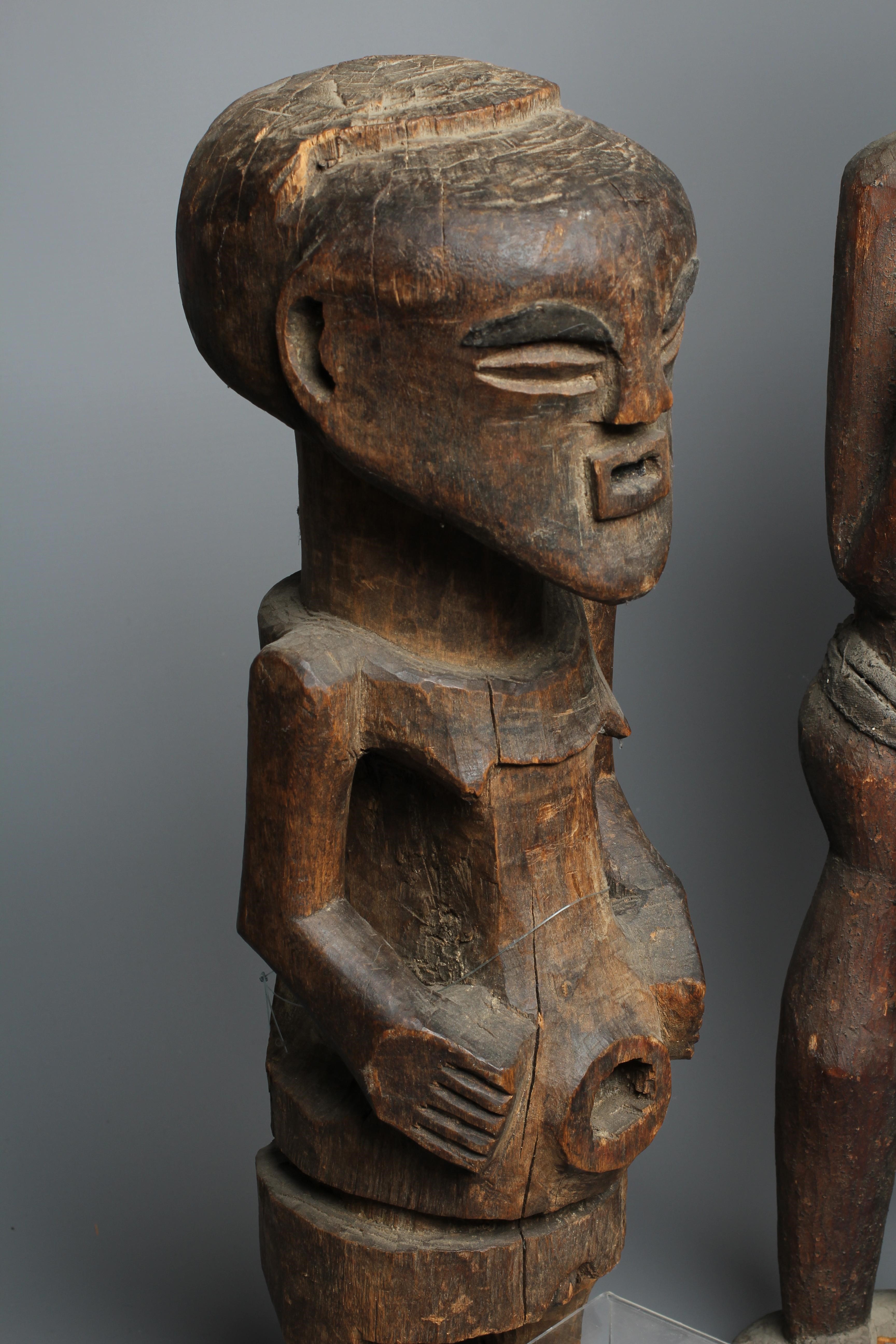 FOUR AFRICAN CARVED WOOD SCULPTURES Image