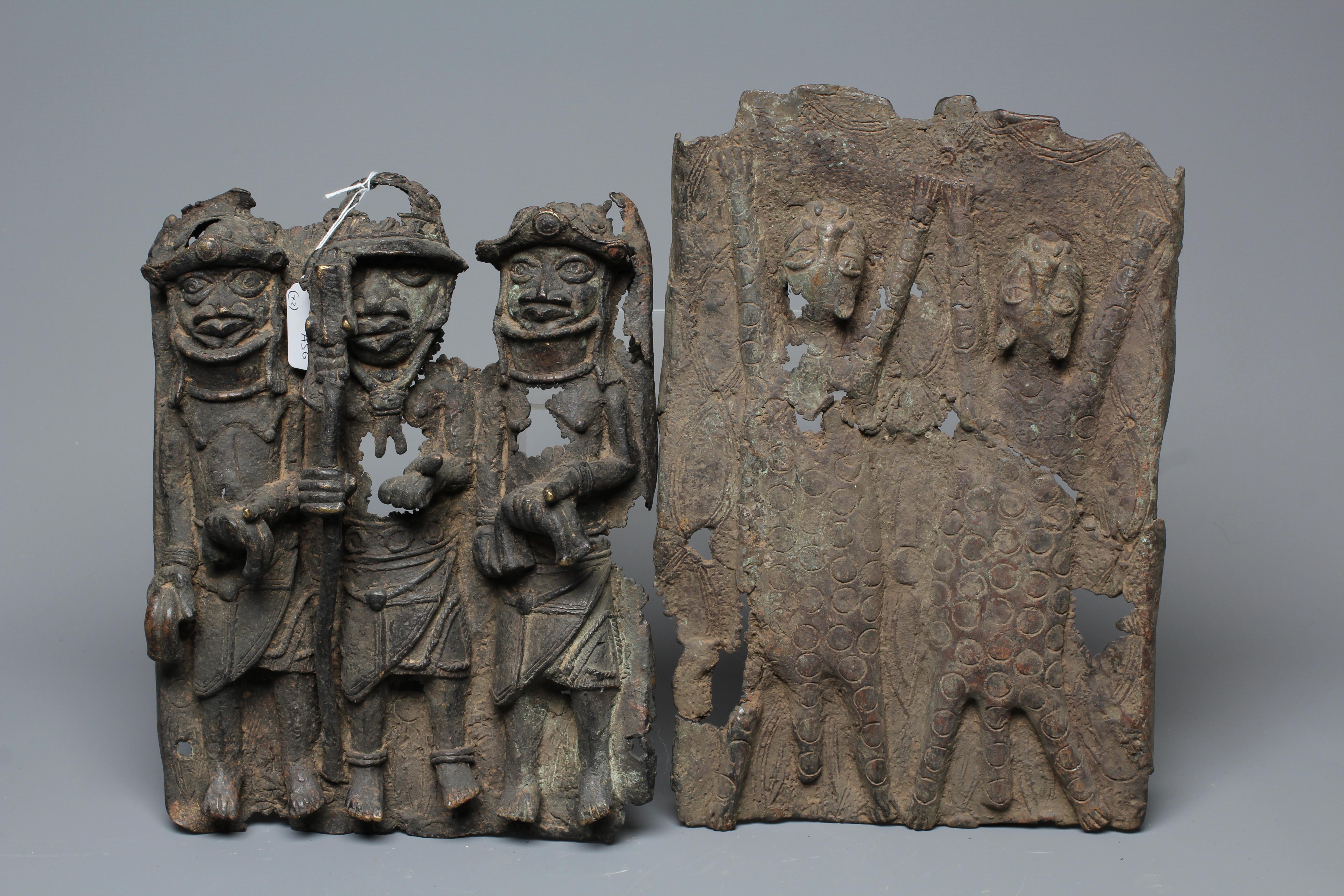 A BENIN BRONZE PLAQUE worked in relief with two leopards, 14 1/2" h x 10" w, together with another Image