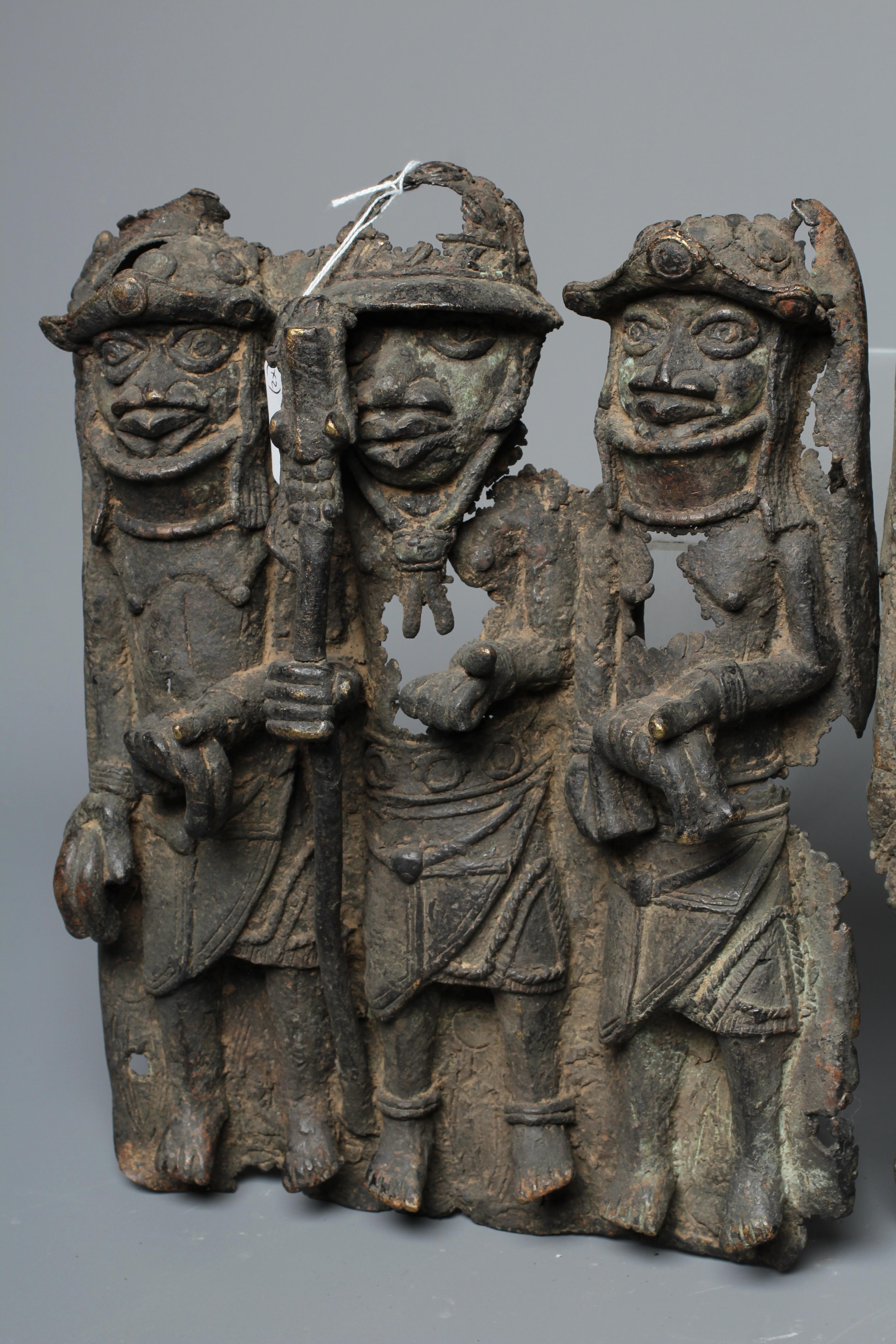 A BENIN BRONZE PLAQUE worked in relief with two leopards, 14 1/2" h x 10" w, together with another Image