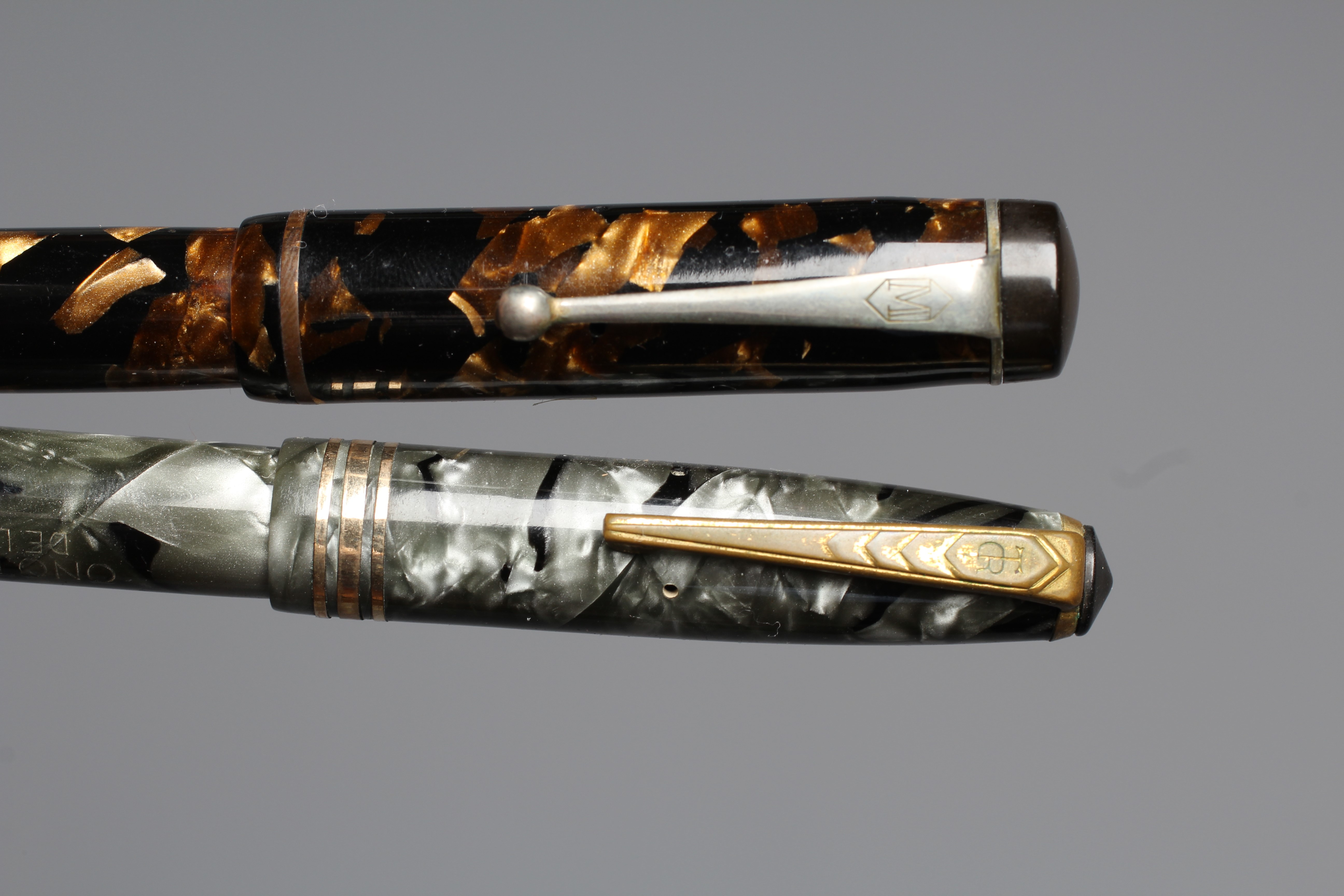 FIVE FOUNTAIN PENS: comprising a black Waterman's Ideal Commando lever filler pen marked 14kt Image