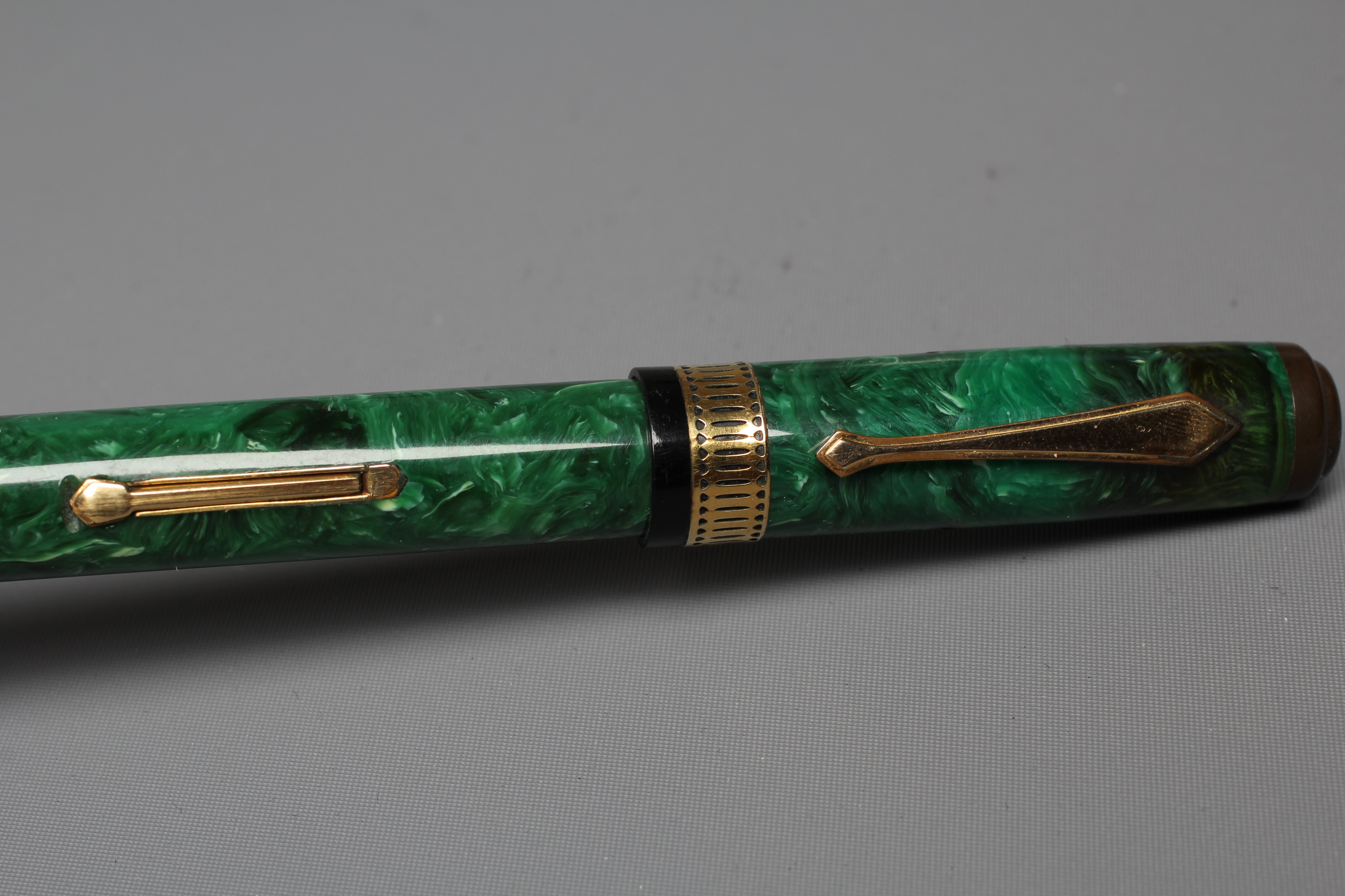 WATERMAN: 1930's Patrician green marbled celluloid lever filler fountain pen with gold plated trim Image
