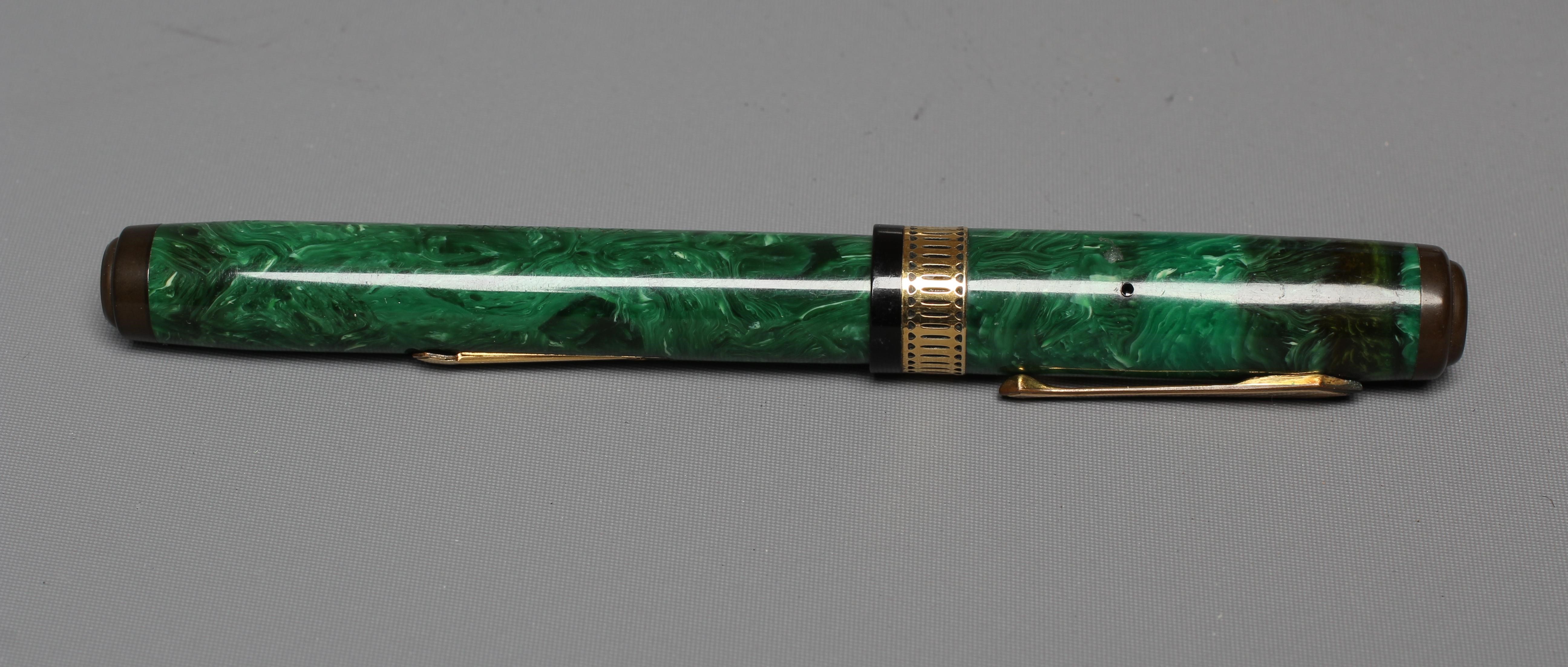 WATERMAN: 1930's Patrician green marbled celluloid lever filler fountain pen with gold plated trim Image