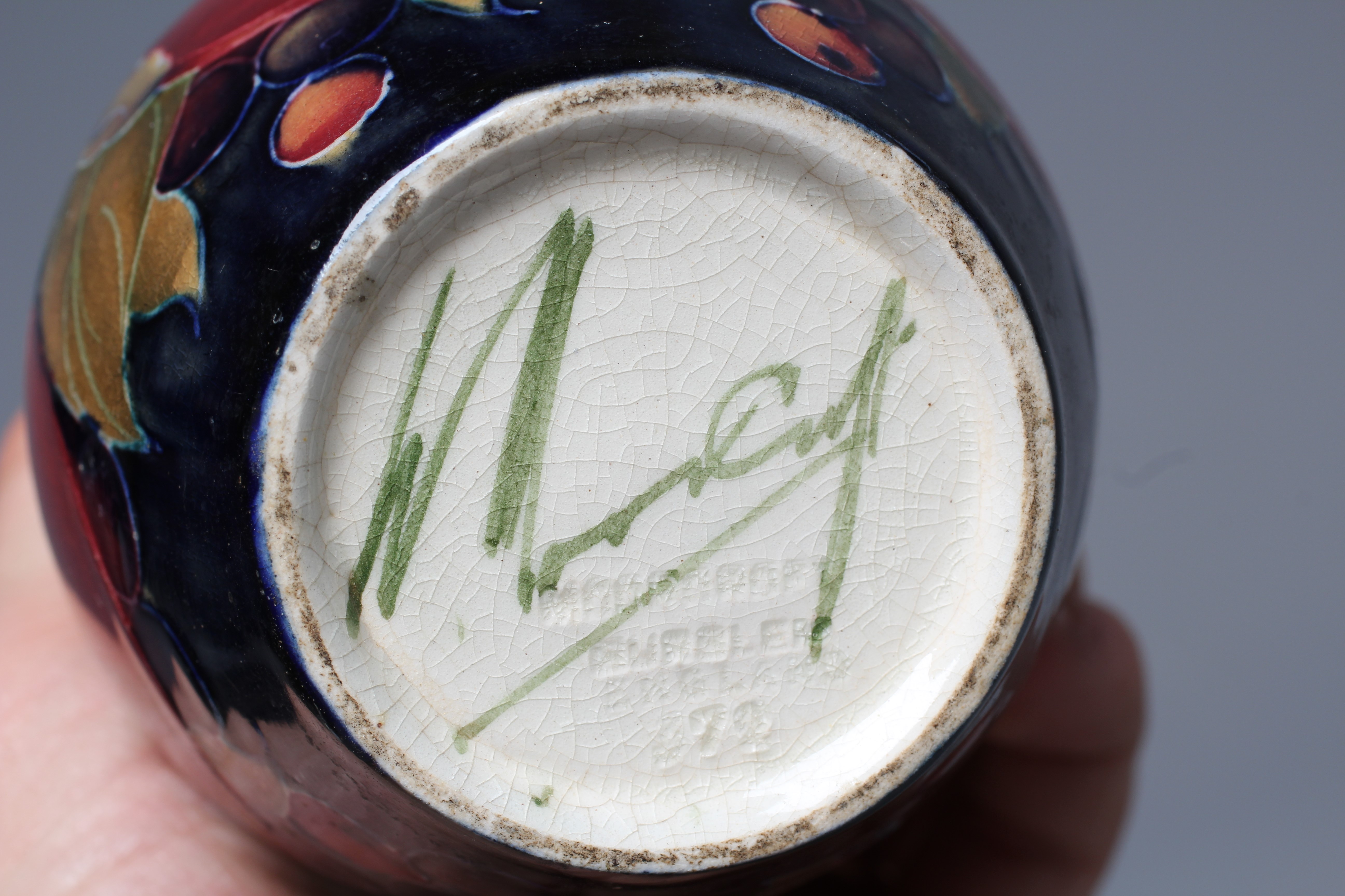 A MOORCROFT POMEGRANATE VASE, early 20th century, of baluster form, impressed Burslem mark, 5 1/2" Image
