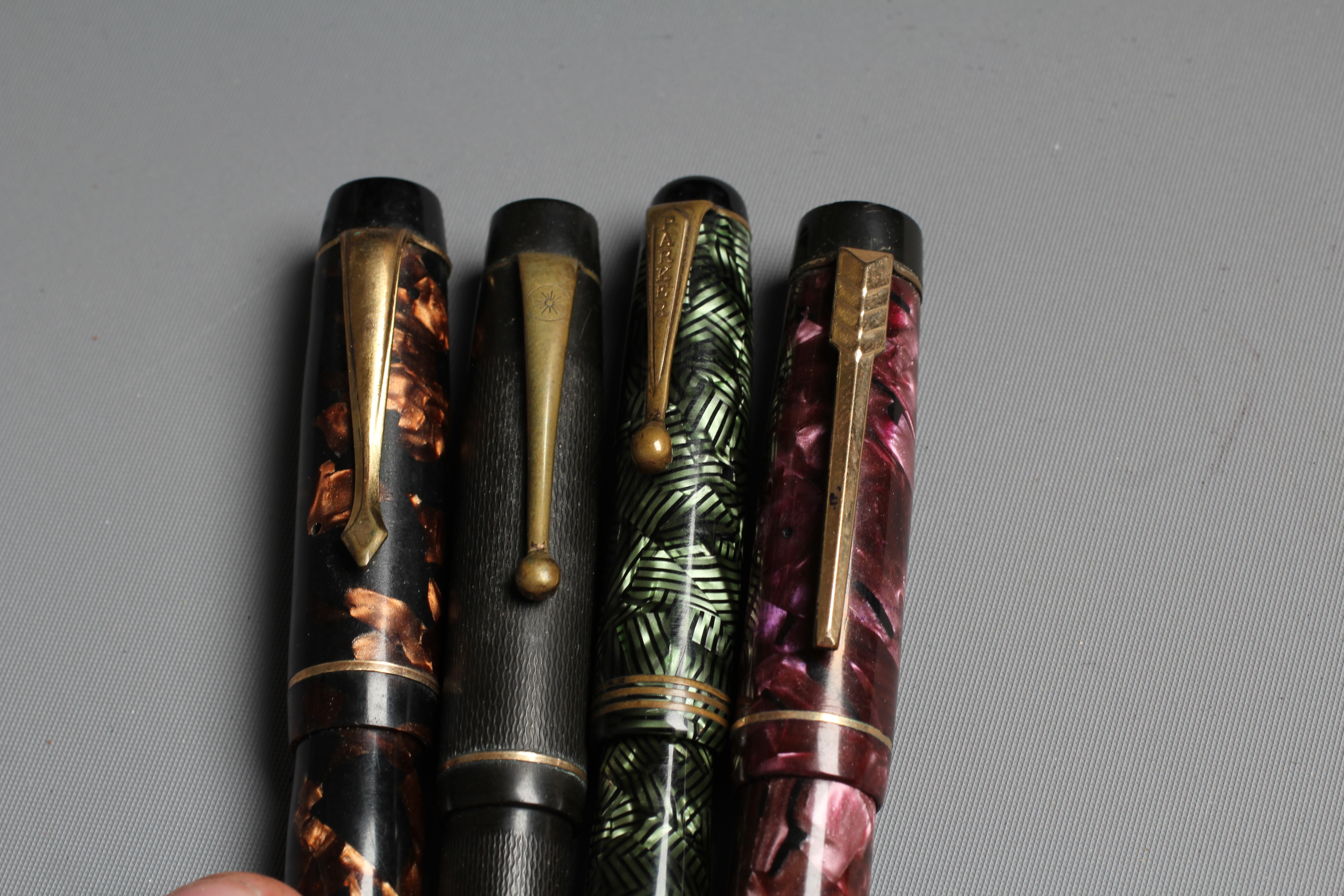 FIVE FOUNTAIN PENS: comprising a black Sheaffer pen marked 14k with original box Image