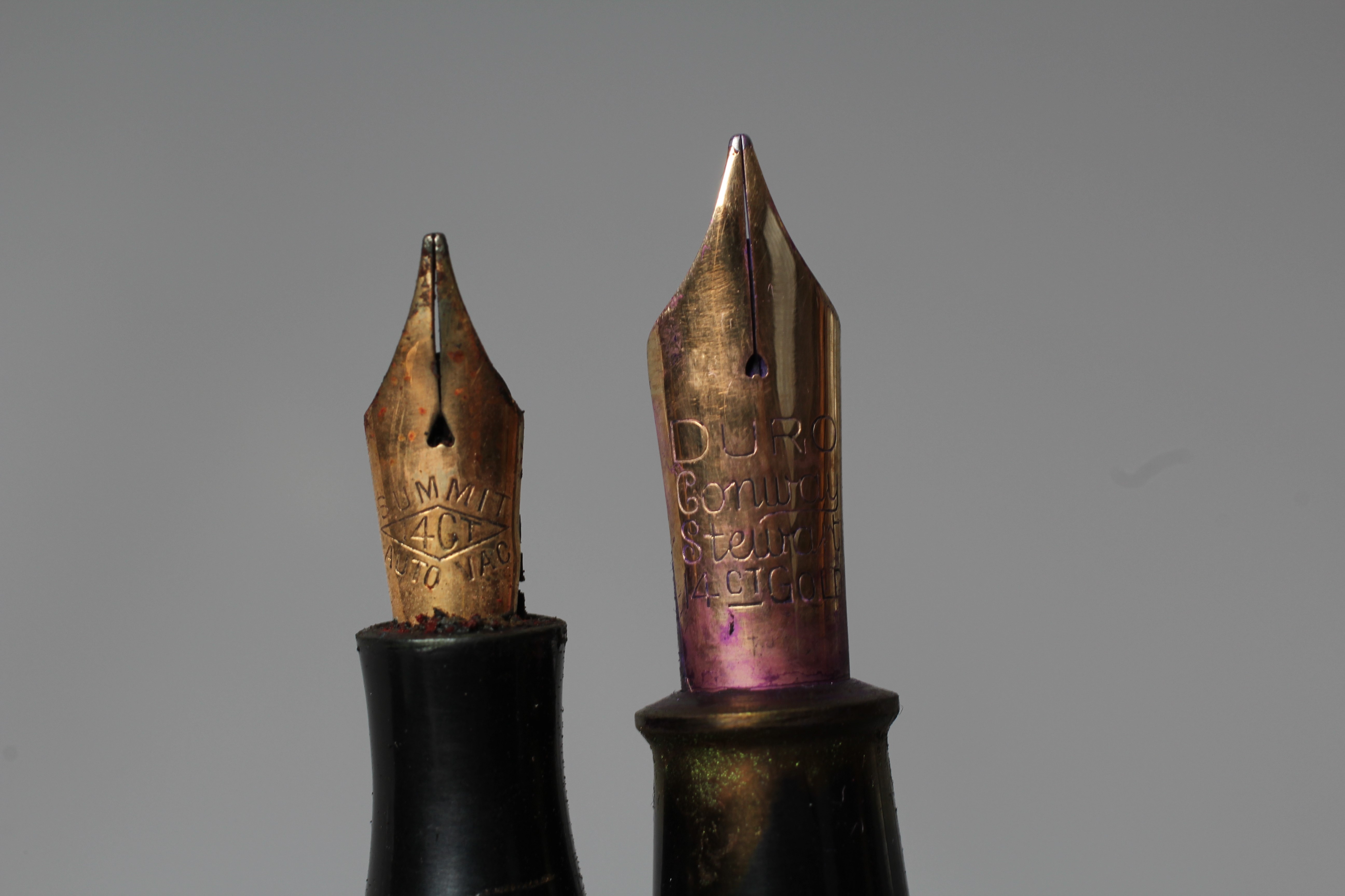 FIVE FOUNTAIN PENS: comprising a black Duro Conway Stewart lever filler pen marked 14ct Image