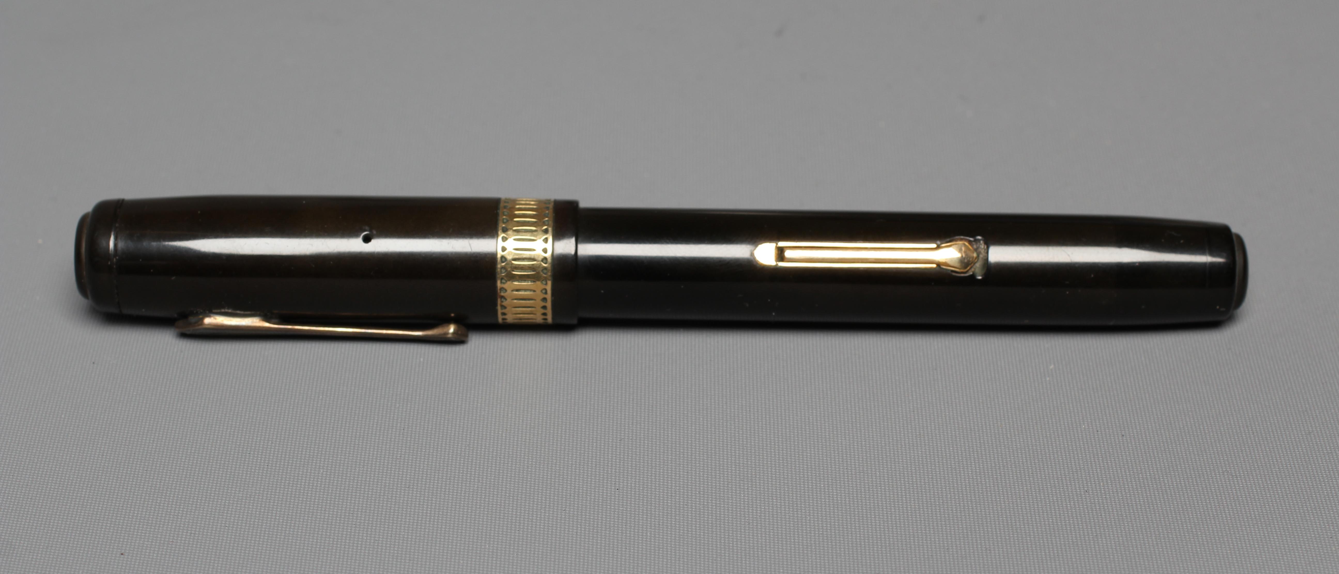 WATERMAN: 1930's Patrician black celluloid lever filler fountain pen with gold plated trim Image