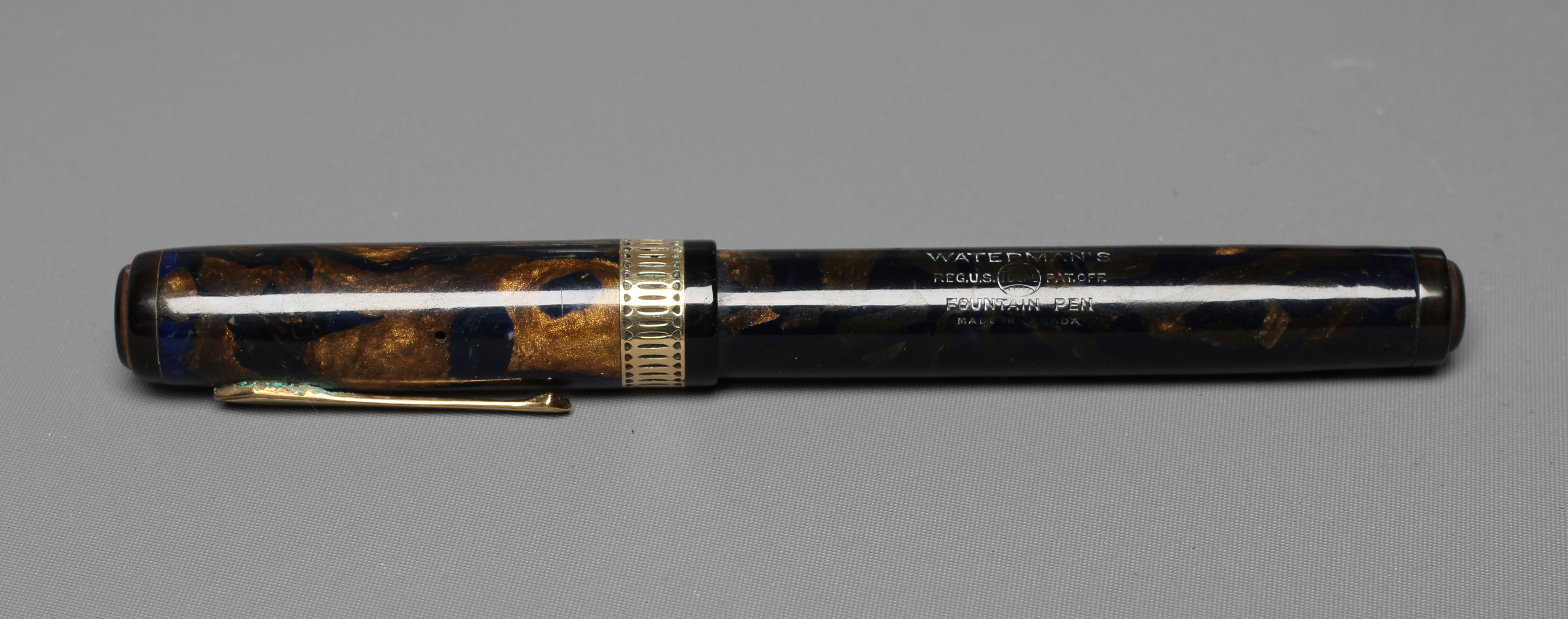 WATERMAN: 1930's Patrician blue and bronze celluloid lever filler fountain pen with gold plated trim Image