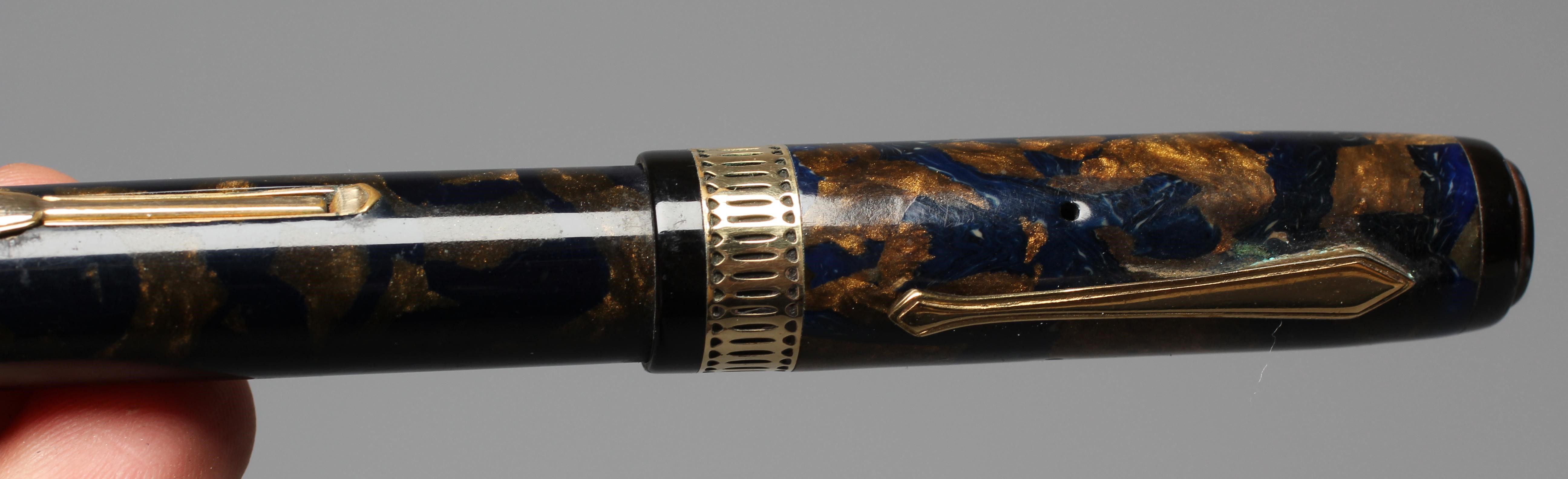 WATERMAN: 1930's Patrician blue and bronze celluloid lever filler fountain pen with gold plated trim Image