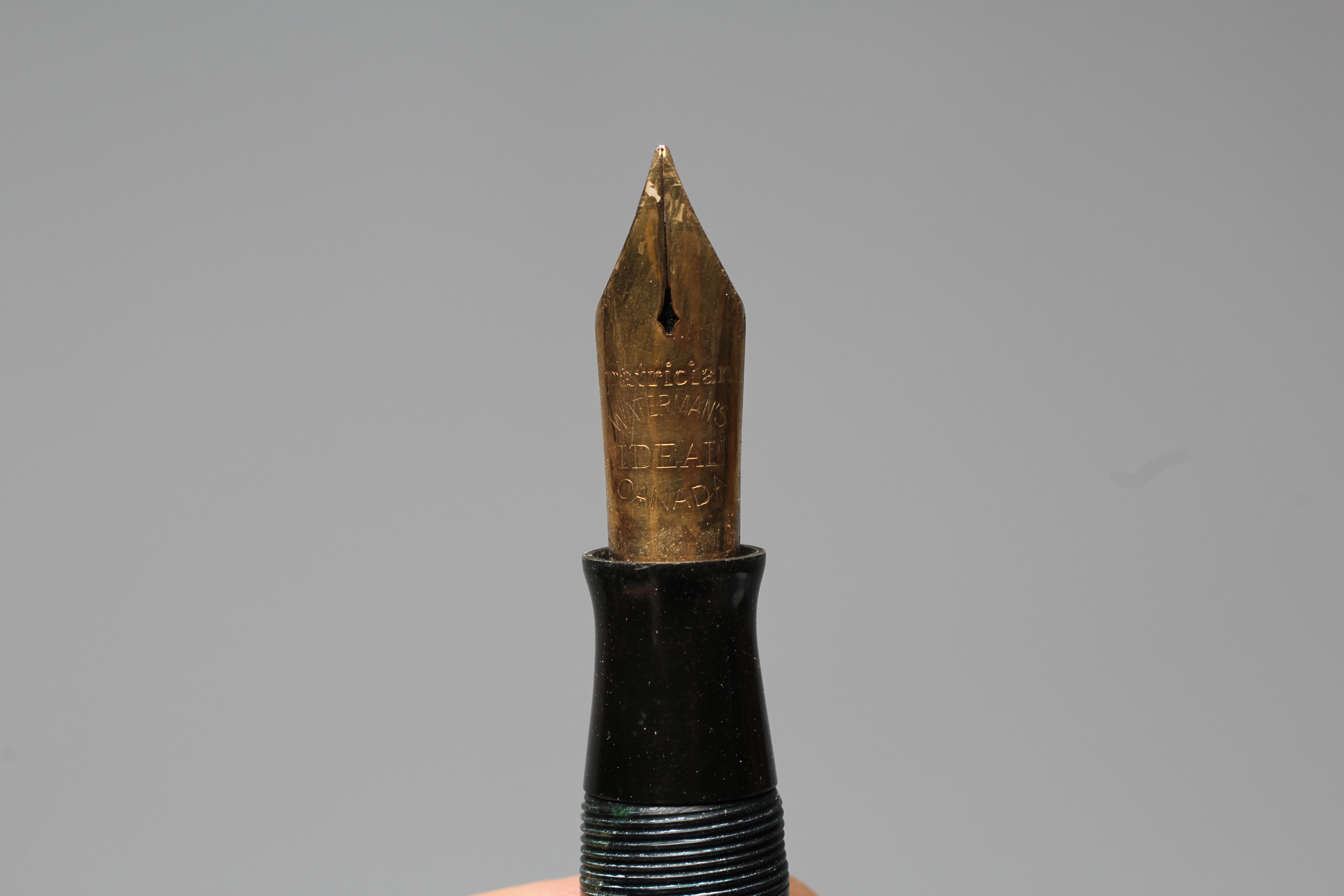 WATERMAN: 1930's Patrician blue and bronze celluloid lever filler fountain pen with gold plated trim Image