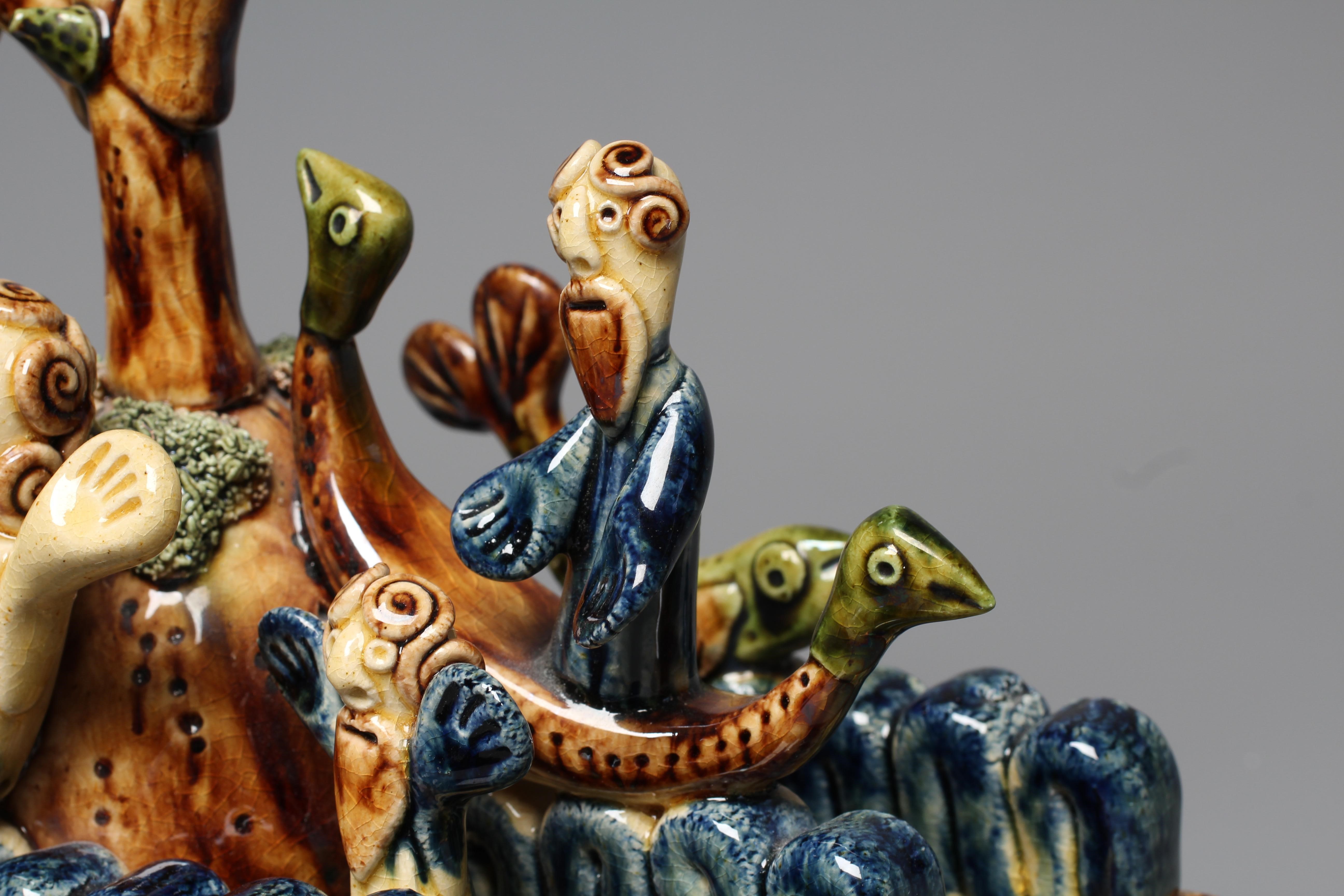 PAUL YOUNG (B.1961) A SLIPWARE MERMAID FIGURE GROUP modelled as a mermaid balancing on waves Image