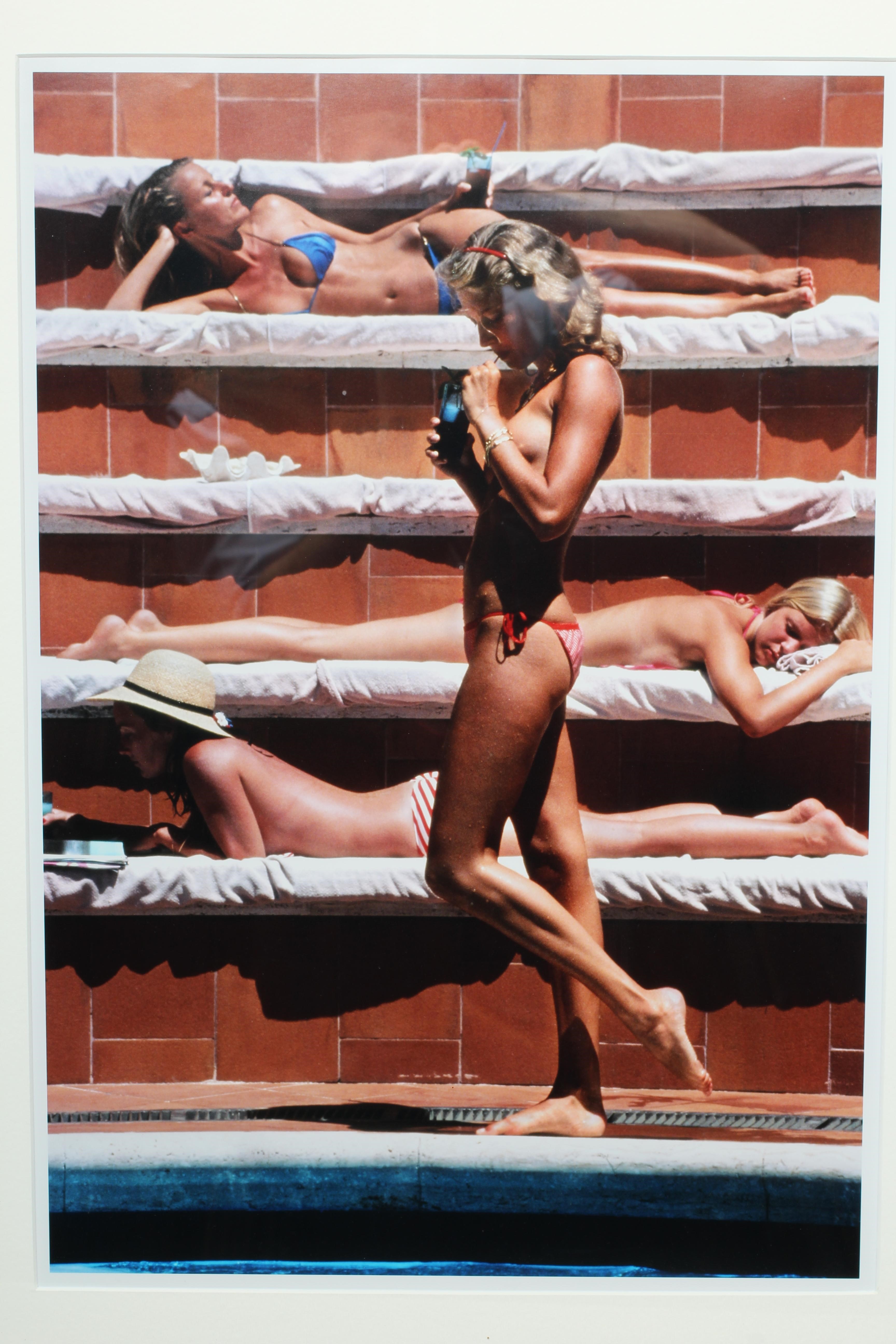 AFTER SLIM AARONS (1916-2006) Beach Scene, digital print, 23 1/2" x 16 1/2", framed and glazed Image
