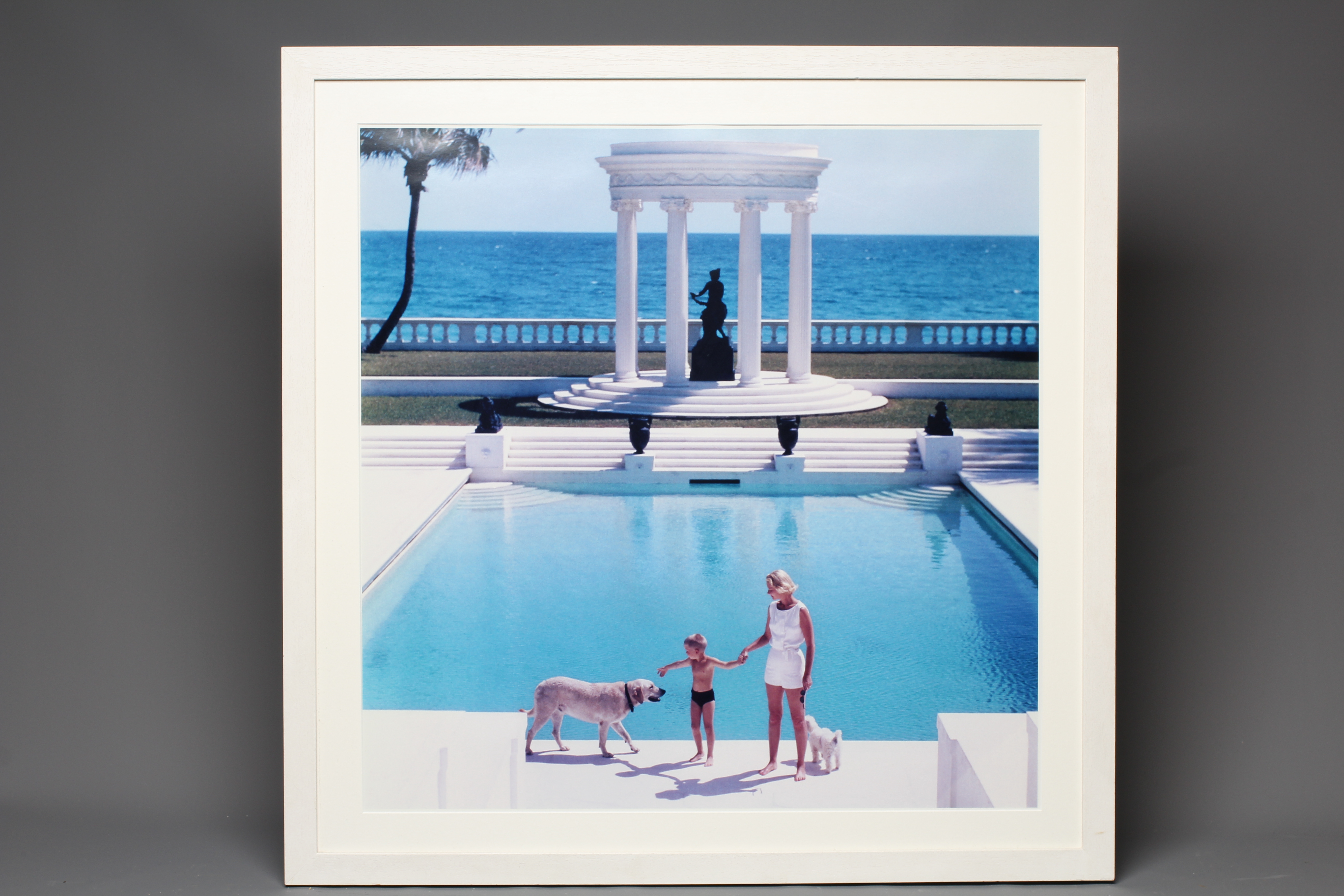 AFTER SLIM AARONS (1916-2000) Nice Pool, photographic print, 26" x 26" (SH), framed and glazed Image