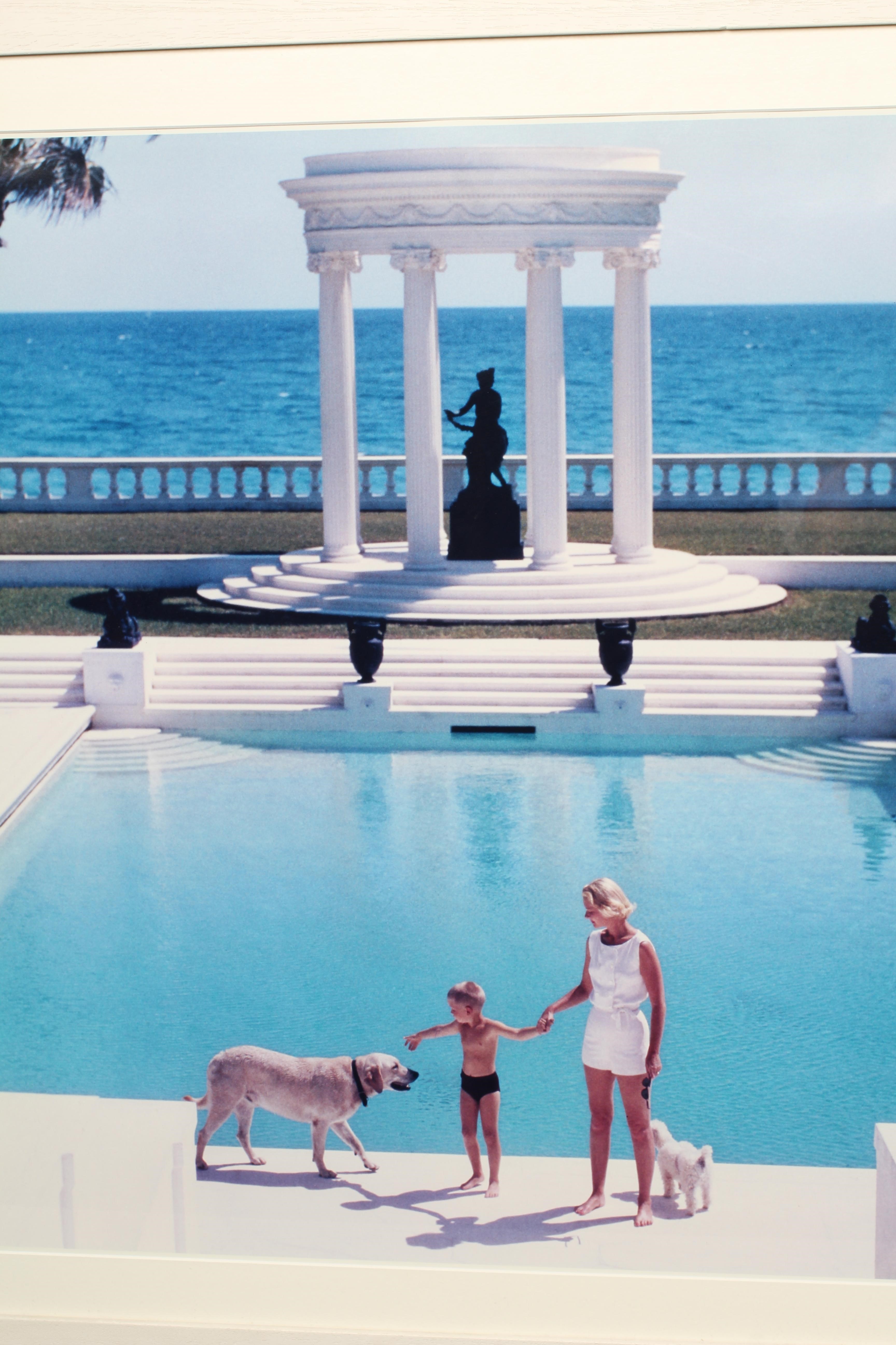 AFTER SLIM AARONS (1916-2000) Nice Pool, photographic print, 26" x 26" (SH), framed and glazed Image