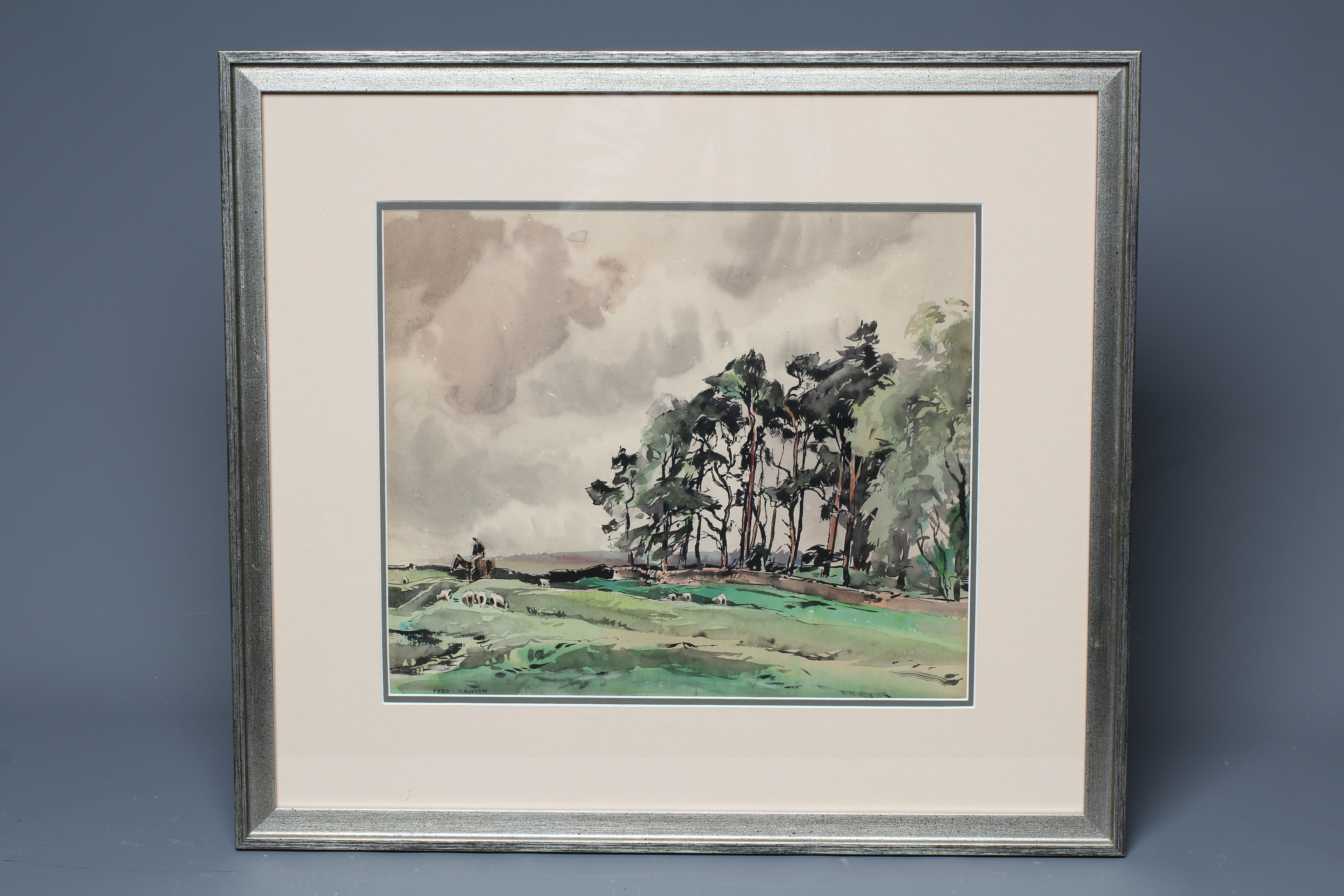 FRED LAWSON (1888-1968) Rural landscape with Man on a Horse beside a Copse, signed lower left, Image